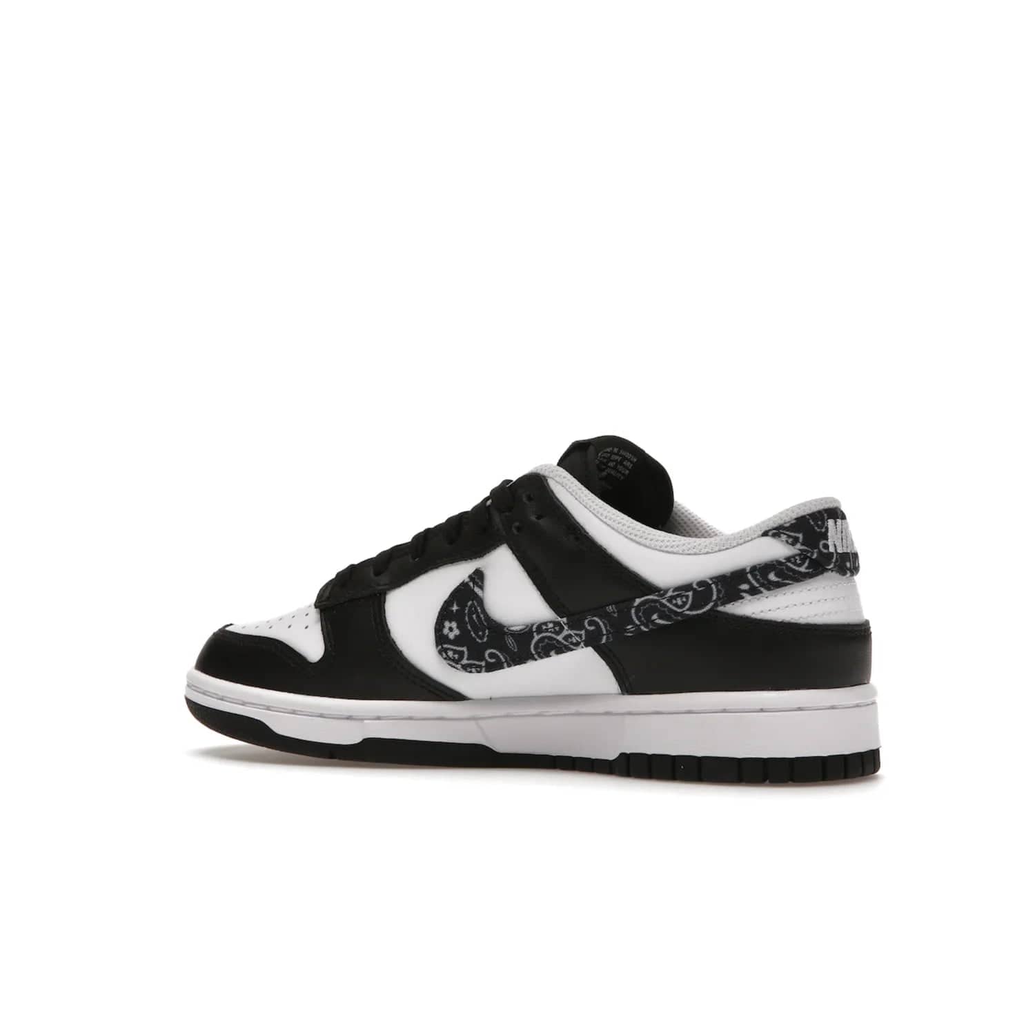 Nike Dunk Low Essential Paisley Pack Black (Women's) - Image 22 - Only at www.BallersClubKickz.com - Make a statement with the all-black Nike Dunk Low Essential Paisley Pack Black (Women's) featuring white leather overlays, a stunning paisley bandana print, and a white midsole for comfort and optimal grip on any surface.