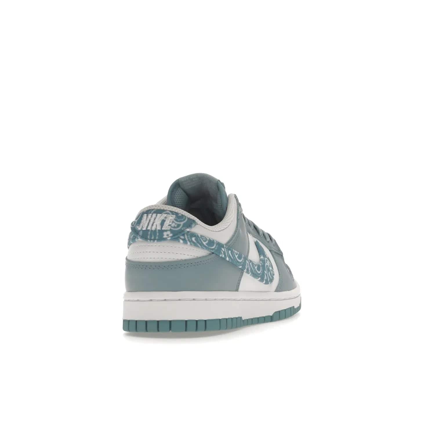Nike Dunk Low Essential Paisley Pack Worn Blue (Women's) - Image 30 - Only at www.BallersClubKickz.com - Get the Nike Dunk Low Essential Paisley Pack Worn Blue (Women's) for style and comfort. White leather construction, light blue leather overlays, canvas Swooshes and matching heel tabs offer a rich blue hue. Finished by a white and light blue sole, this classic Nike Dunk is the perfect addition to any wardrobe. Released in March 2022.