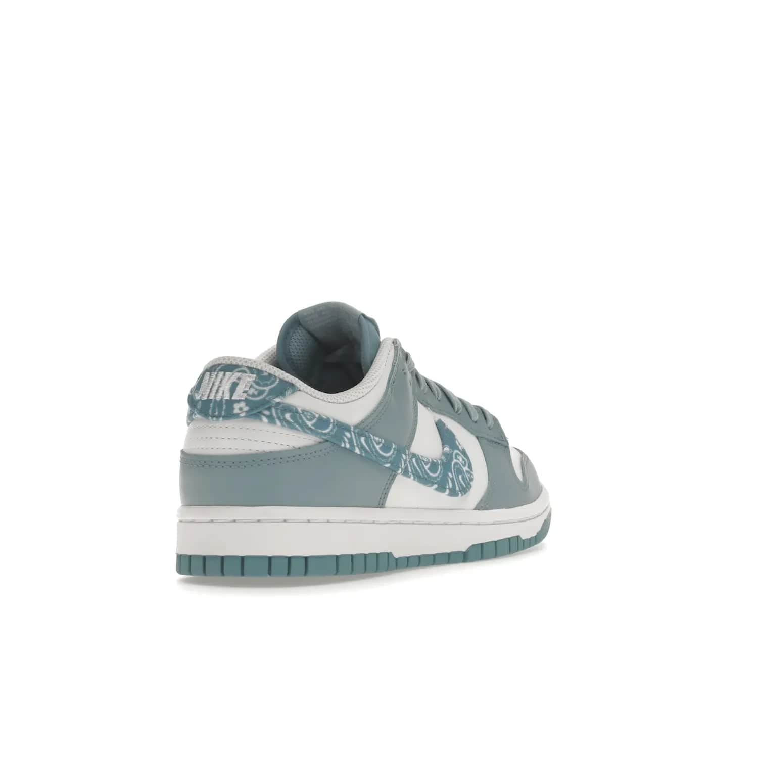 Nike Dunk Low Essential Paisley Pack Worn Blue (Women's) - Image 31 - Only at www.BallersClubKickz.com - Get the Nike Dunk Low Essential Paisley Pack Worn Blue (Women's) for style and comfort. White leather construction, light blue leather overlays, canvas Swooshes and matching heel tabs offer a rich blue hue. Finished by a white and light blue sole, this classic Nike Dunk is the perfect addition to any wardrobe. Released in March 2022.