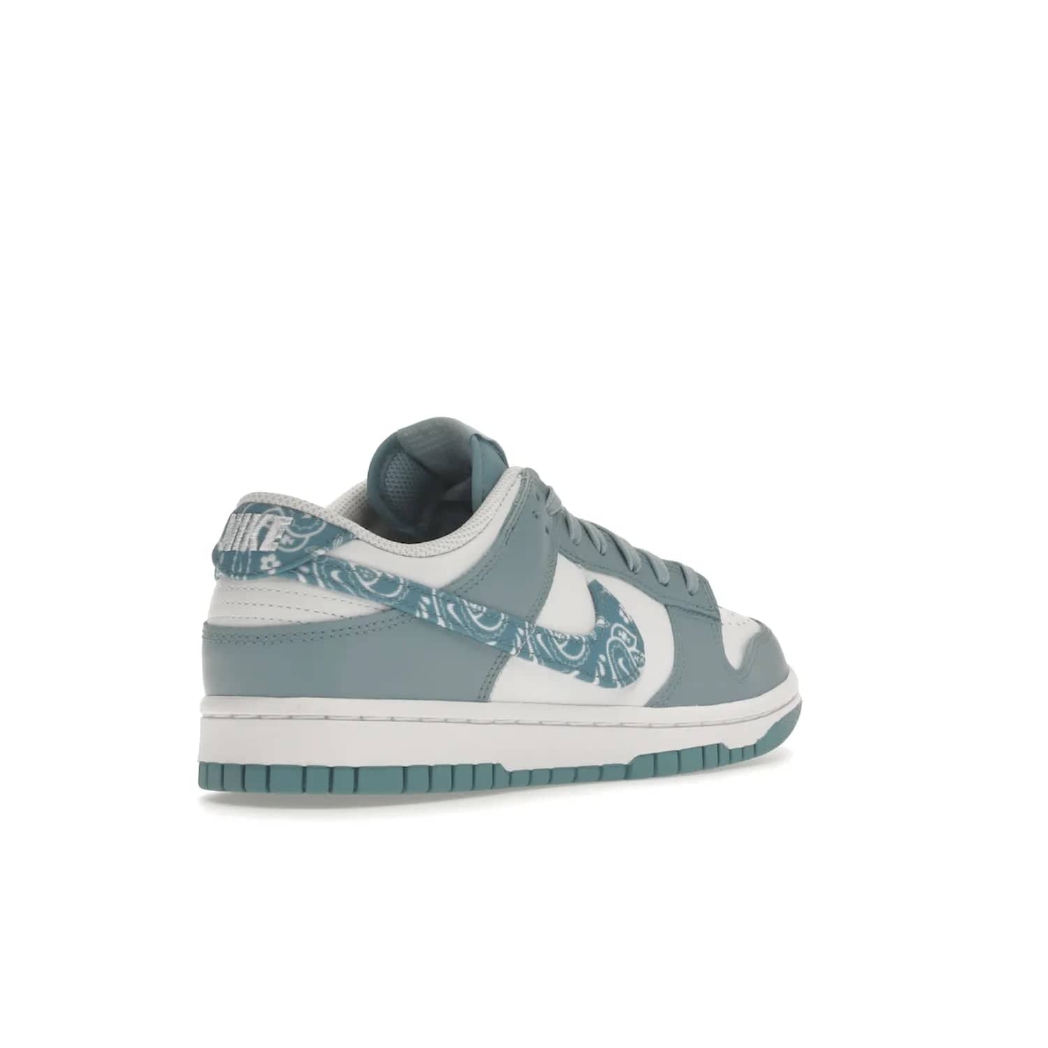 Nike Dunk Low Essential Paisley Pack Worn Blue (Women's) - Image 32 - Only at www.BallersClubKickz.com - Get the Nike Dunk Low Essential Paisley Pack Worn Blue (Women's) for style and comfort. White leather construction, light blue leather overlays, canvas Swooshes and matching heel tabs offer a rich blue hue. Finished by a white and light blue sole, this classic Nike Dunk is the perfect addition to any wardrobe. Released in March 2022.