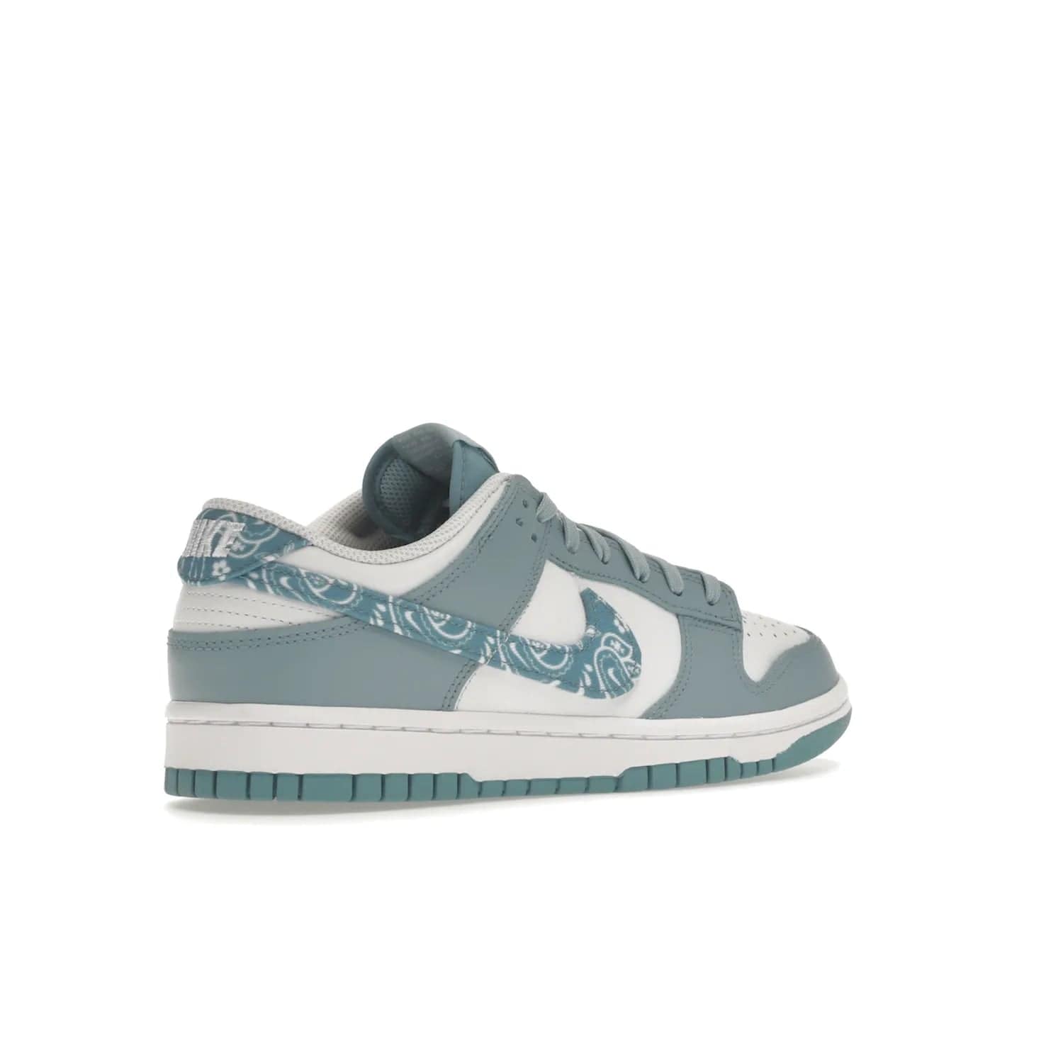 Nike Dunk Low Essential Paisley Pack Worn Blue (Women's) - Image 33 - Only at www.BallersClubKickz.com - Get the Nike Dunk Low Essential Paisley Pack Worn Blue (Women's) for style and comfort. White leather construction, light blue leather overlays, canvas Swooshes and matching heel tabs offer a rich blue hue. Finished by a white and light blue sole, this classic Nike Dunk is the perfect addition to any wardrobe. Released in March 2022.