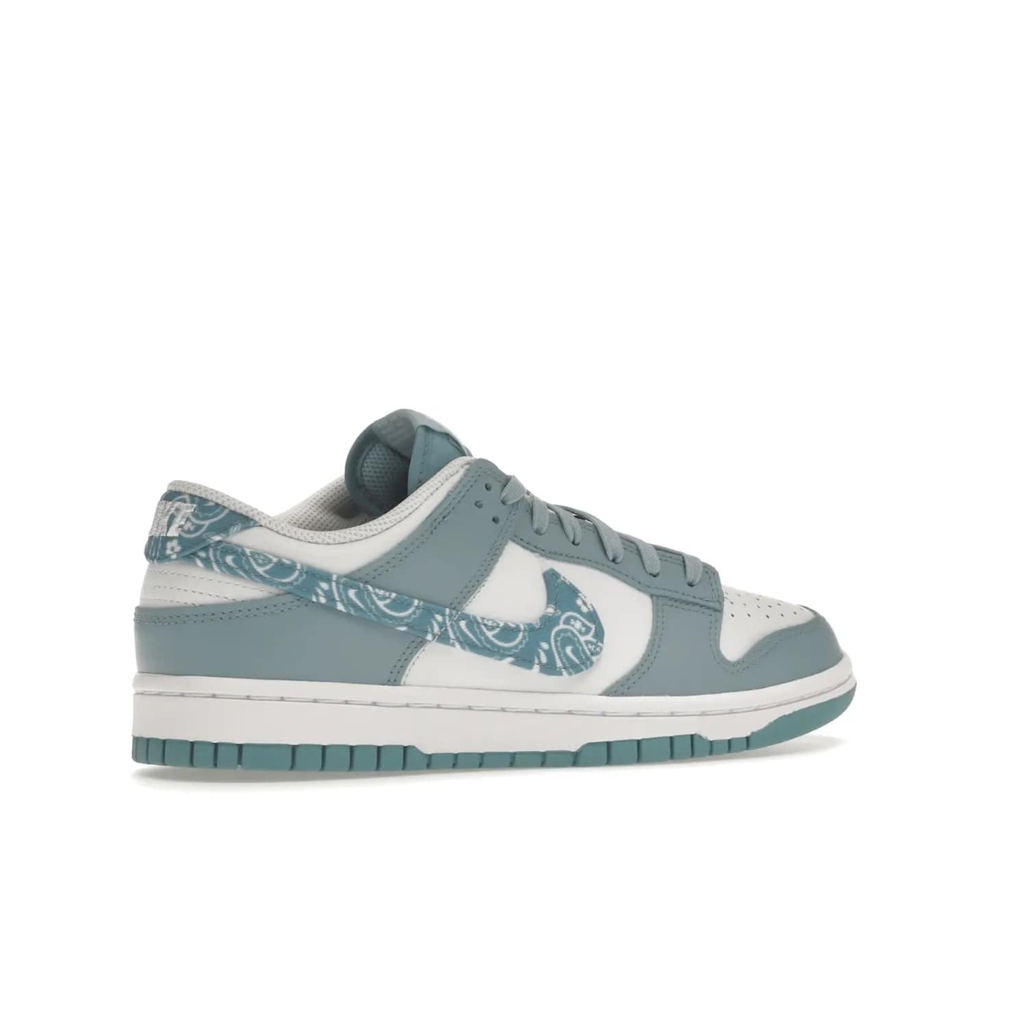 Nike Dunk Low Essential Paisley Pack Worn Blue (Women's) - Image 34 - Only at www.BallersClubKickz.com - Get the Nike Dunk Low Essential Paisley Pack Worn Blue (Women's) for style and comfort. White leather construction, light blue leather overlays, canvas Swooshes and matching heel tabs offer a rich blue hue. Finished by a white and light blue sole, this classic Nike Dunk is the perfect addition to any wardrobe. Released in March 2022.