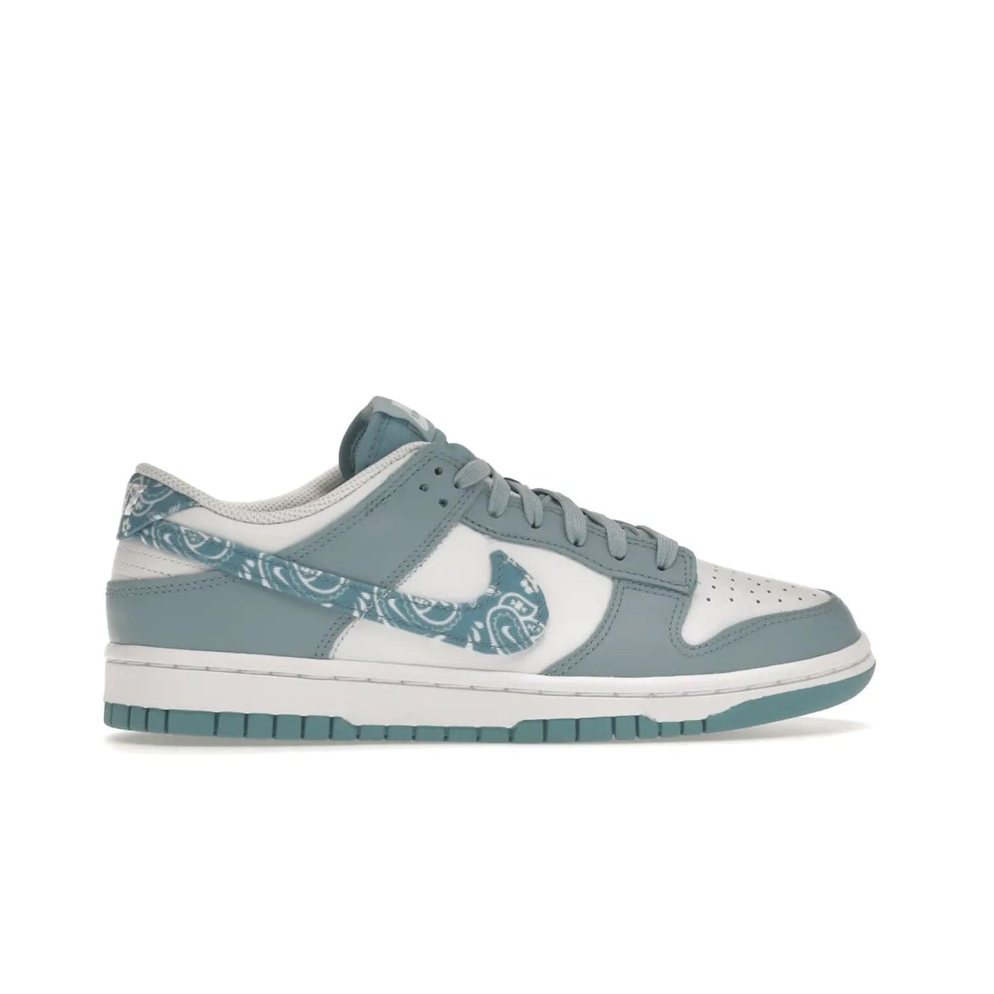 Nike Dunk Low Essential Paisley Pack Worn Blue (Women's) - Image 36 - Only at www.BallersClubKickz.com - Get the Nike Dunk Low Essential Paisley Pack Worn Blue (Women's) for style and comfort. White leather construction, light blue leather overlays, canvas Swooshes and matching heel tabs offer a rich blue hue. Finished by a white and light blue sole, this classic Nike Dunk is the perfect addition to any wardrobe. Released in March 2022.