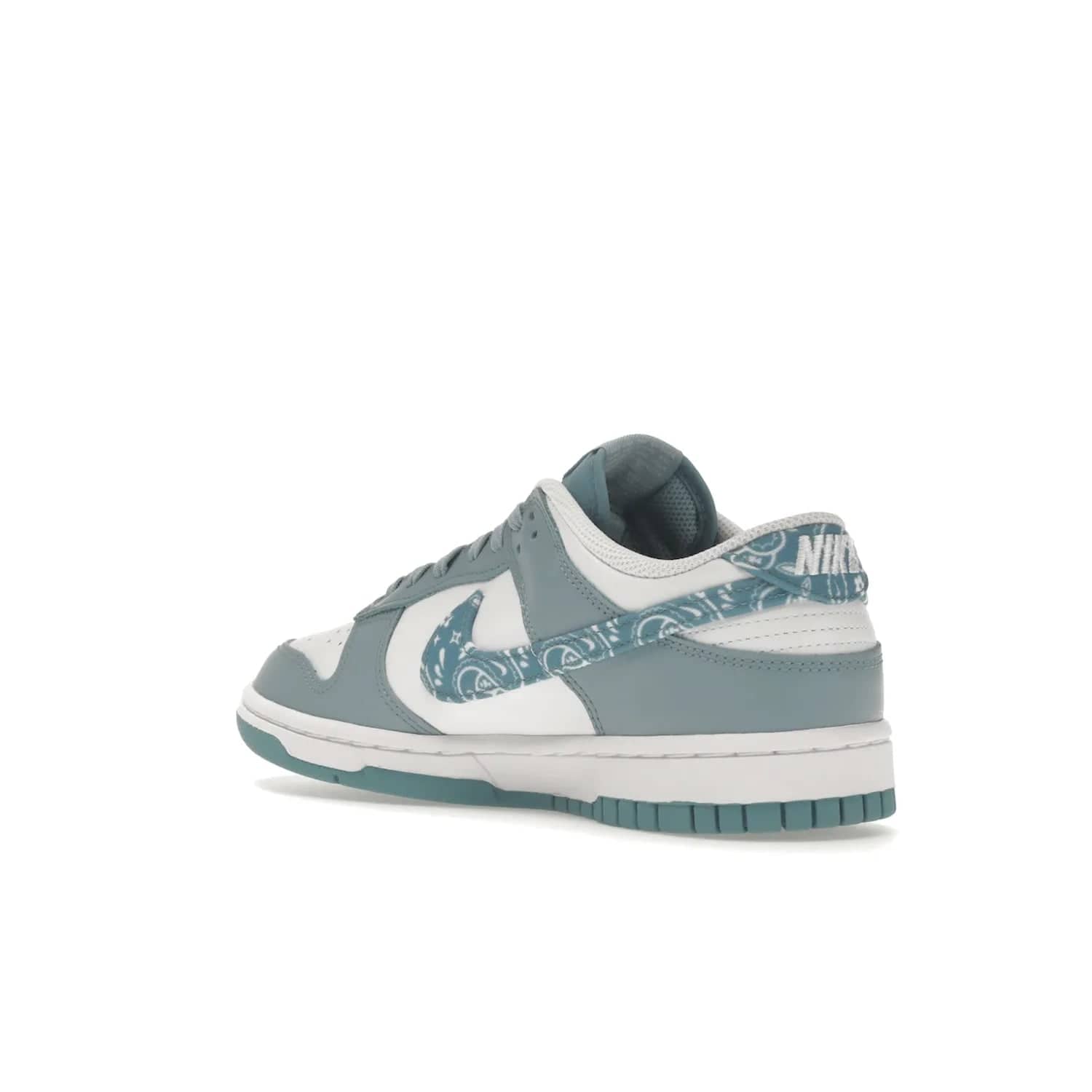 Nike Dunk Low Essential Paisley Pack Worn Blue (Women's) - Image 24 - Only at www.BallersClubKickz.com - Get the Nike Dunk Low Essential Paisley Pack Worn Blue (Women's) for style and comfort. White leather construction, light blue leather overlays, canvas Swooshes and matching heel tabs offer a rich blue hue. Finished by a white and light blue sole, this classic Nike Dunk is the perfect addition to any wardrobe. Released in March 2022.