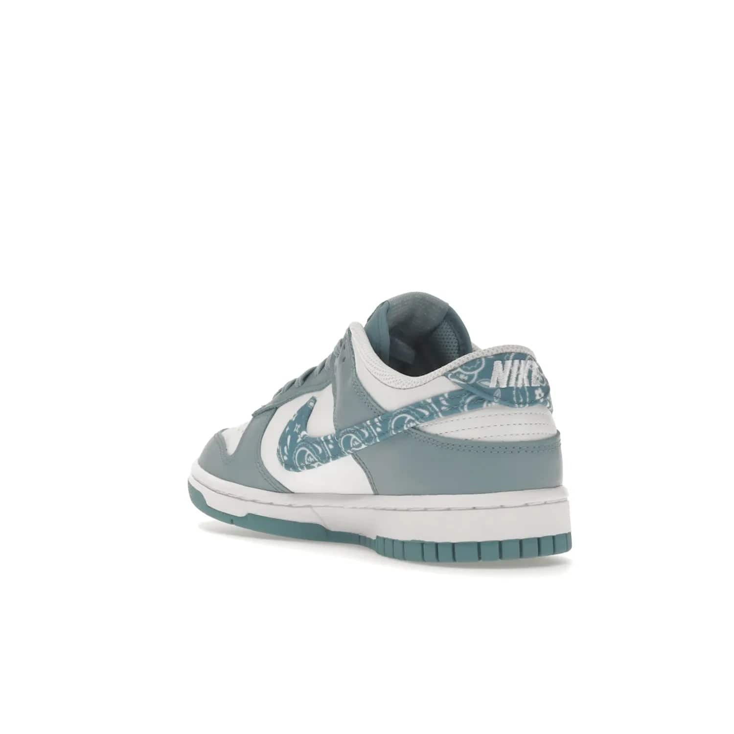 Nike Dunk Low Essential Paisley Pack Worn Blue (Women's) - Image 25 - Only at www.BallersClubKickz.com - Get the Nike Dunk Low Essential Paisley Pack Worn Blue (Women's) for style and comfort. White leather construction, light blue leather overlays, canvas Swooshes and matching heel tabs offer a rich blue hue. Finished by a white and light blue sole, this classic Nike Dunk is the perfect addition to any wardrobe. Released in March 2022.