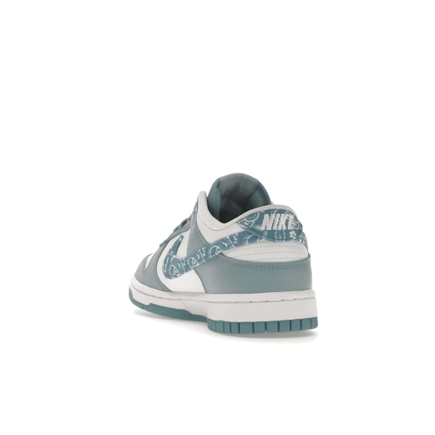 Nike Dunk Low Essential Paisley Pack Worn Blue (Women's) - Image 26 - Only at www.BallersClubKickz.com - Get the Nike Dunk Low Essential Paisley Pack Worn Blue (Women's) for style and comfort. White leather construction, light blue leather overlays, canvas Swooshes and matching heel tabs offer a rich blue hue. Finished by a white and light blue sole, this classic Nike Dunk is the perfect addition to any wardrobe. Released in March 2022.
