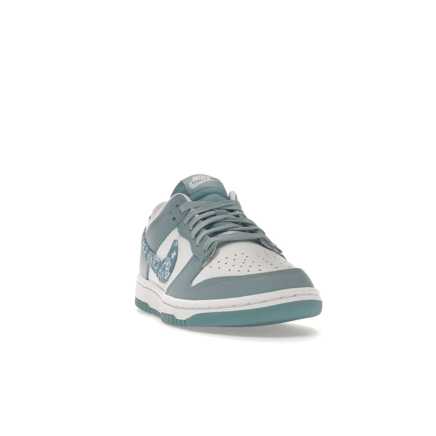 Nike Dunk Low Essential Paisley Pack Worn Blue (Women's) - Image 8 - Only at www.BallersClubKickz.com - Get the Nike Dunk Low Essential Paisley Pack Worn Blue (Women's) for style and comfort. White leather construction, light blue leather overlays, canvas Swooshes and matching heel tabs offer a rich blue hue. Finished by a white and light blue sole, this classic Nike Dunk is the perfect addition to any wardrobe. Released in March 2022.