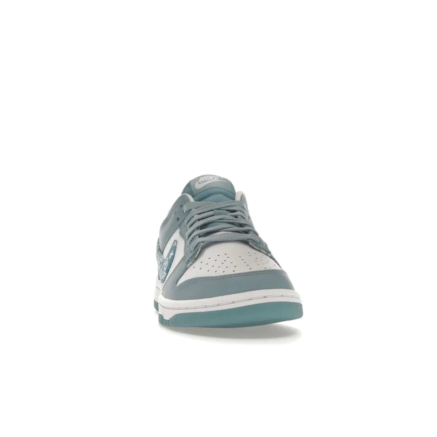 Nike Dunk Low Essential Paisley Pack Worn Blue (Women's) - Image 9 - Only at www.BallersClubKickz.com - Get the Nike Dunk Low Essential Paisley Pack Worn Blue (Women's) for style and comfort. White leather construction, light blue leather overlays, canvas Swooshes and matching heel tabs offer a rich blue hue. Finished by a white and light blue sole, this classic Nike Dunk is the perfect addition to any wardrobe. Released in March 2022.