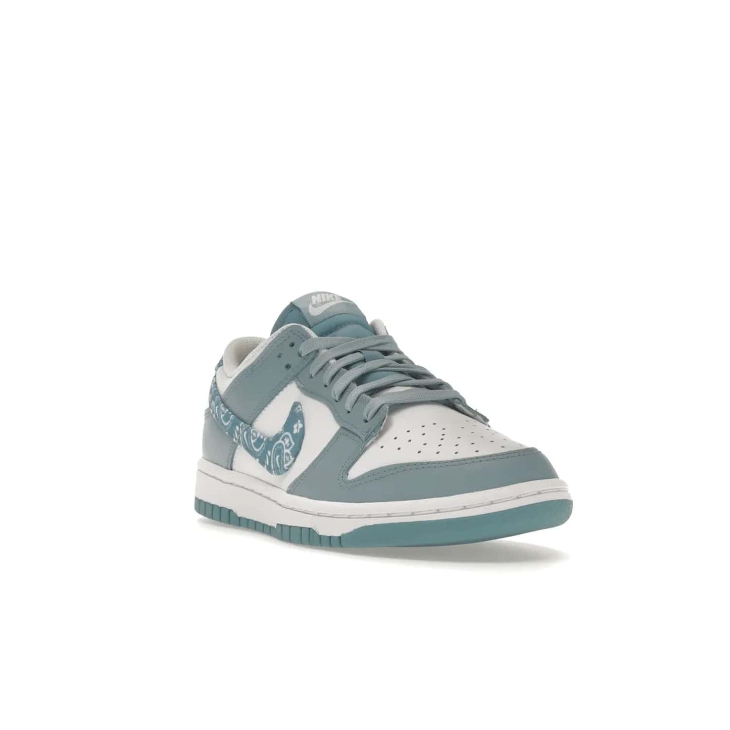 Nike Dunk Low Essential Paisley Pack Worn Blue (Women's) - Image 7 - Only at www.BallersClubKickz.com - Get the Nike Dunk Low Essential Paisley Pack Worn Blue (Women's) for style and comfort. White leather construction, light blue leather overlays, canvas Swooshes and matching heel tabs offer a rich blue hue. Finished by a white and light blue sole, this classic Nike Dunk is the perfect addition to any wardrobe. Released in March 2022.