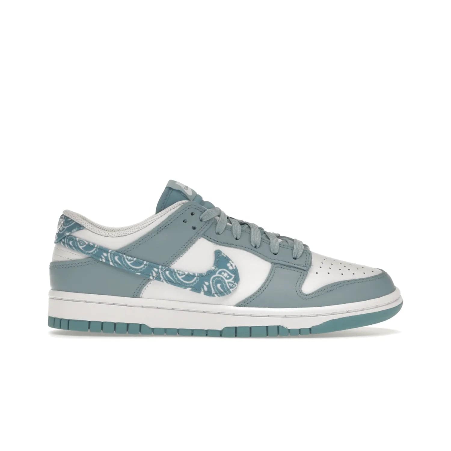 Nike Dunk Low Essential Paisley Pack Worn Blue (Women's) - Image 1 - Only at www.BallersClubKickz.com - Get the Nike Dunk Low Essential Paisley Pack Worn Blue (Women's) for style and comfort. White leather construction, light blue leather overlays, canvas Swooshes and matching heel tabs offer a rich blue hue. Finished by a white and light blue sole, this classic Nike Dunk is the perfect addition to any wardrobe. Released in March 2022.