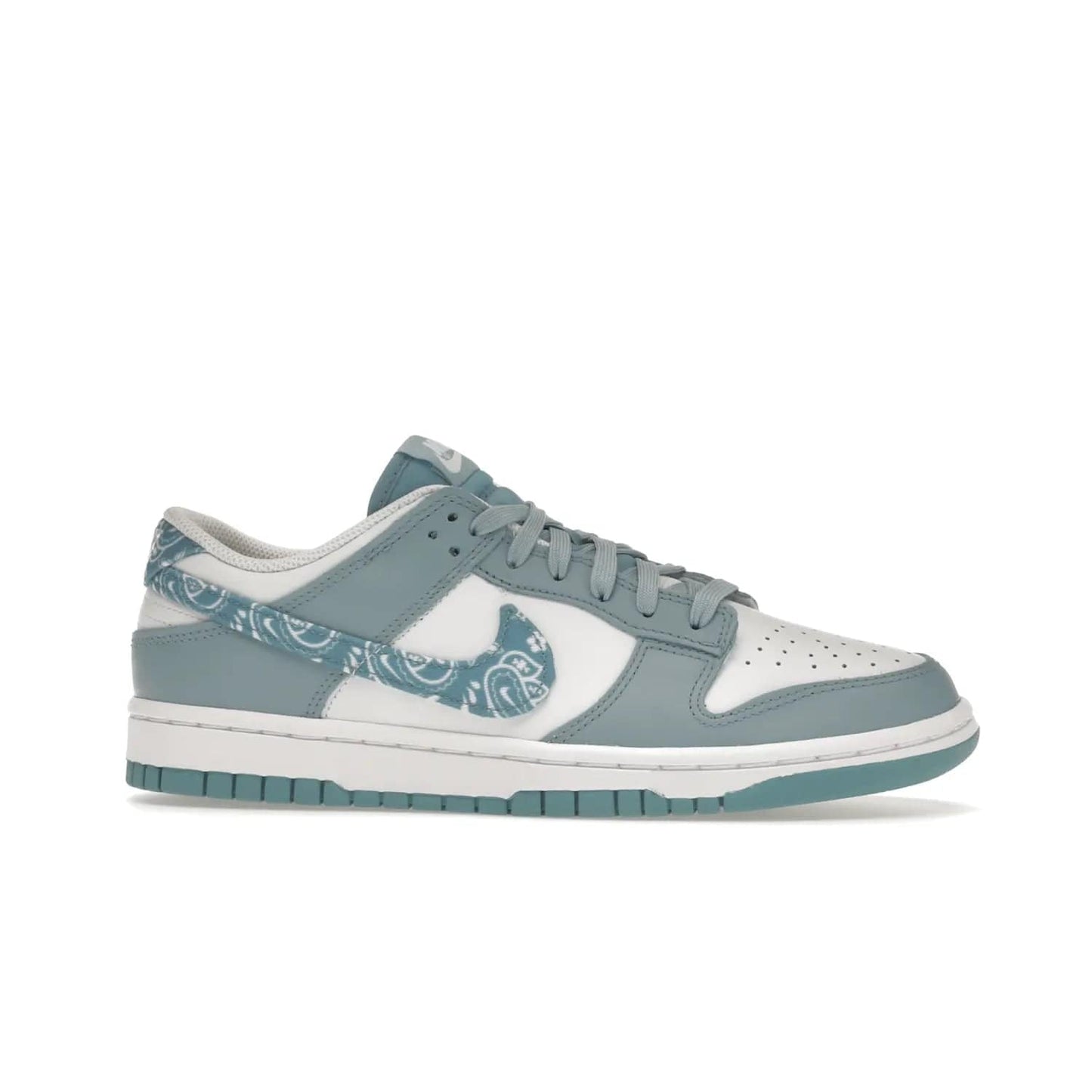 Nike Dunk Low Essential Paisley Pack Worn Blue (Women's) - Image 2 - Only at www.BallersClubKickz.com - Get the Nike Dunk Low Essential Paisley Pack Worn Blue (Women's) for style and comfort. White leather construction, light blue leather overlays, canvas Swooshes and matching heel tabs offer a rich blue hue. Finished by a white and light blue sole, this classic Nike Dunk is the perfect addition to any wardrobe. Released in March 2022.