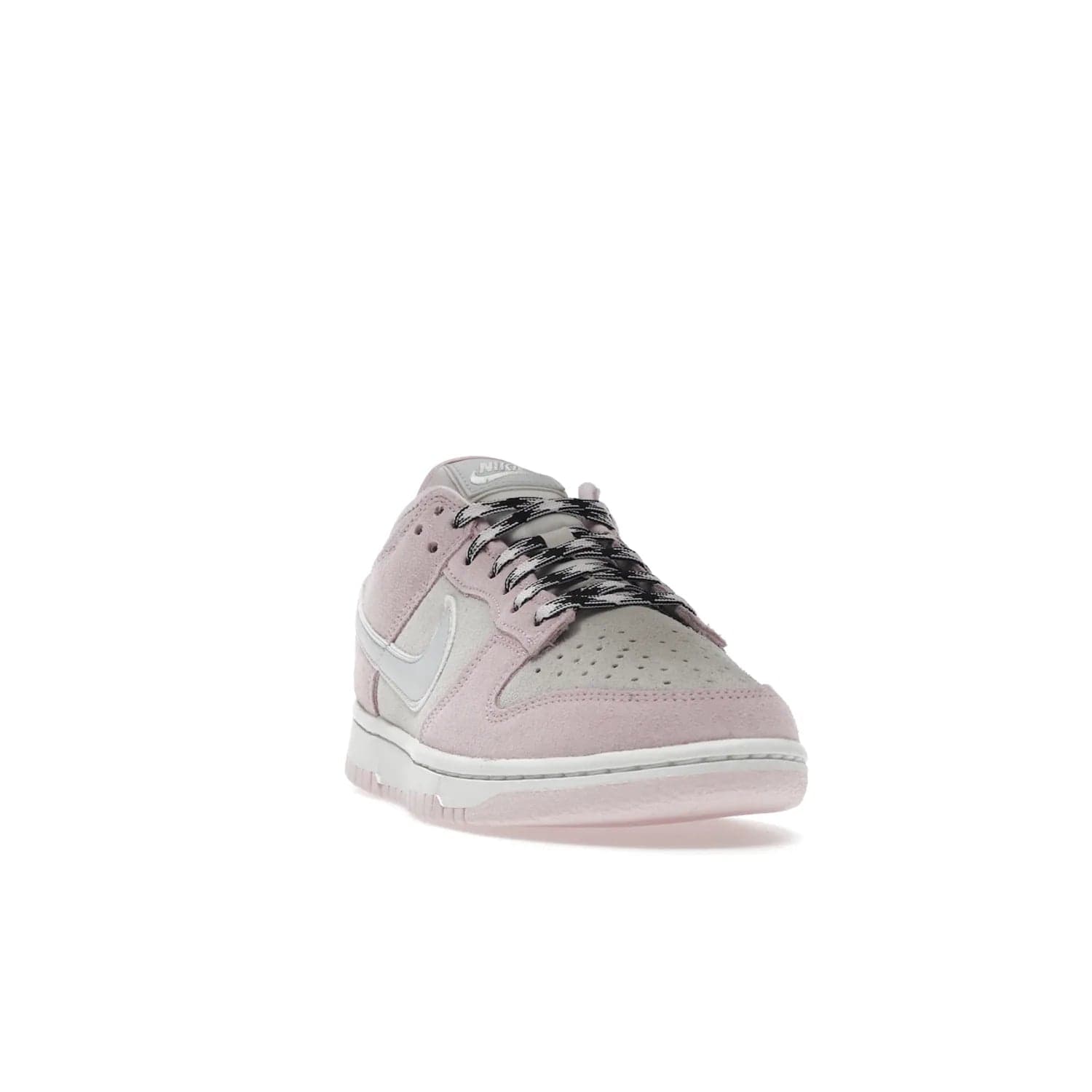 Nike Dunk Low LX Pink Foam (Women's) - Image 8 - Only at www.BallersClubKickz.com - Feminine & fashionable Nike Dunk Low LX Pink Foam W sneaker. Featuring leather and synthetic materials and durable rubber sole. Lace-up design ensures a snug fit. Released Dec. 10th 2022, $120. Stylish and comfortable.