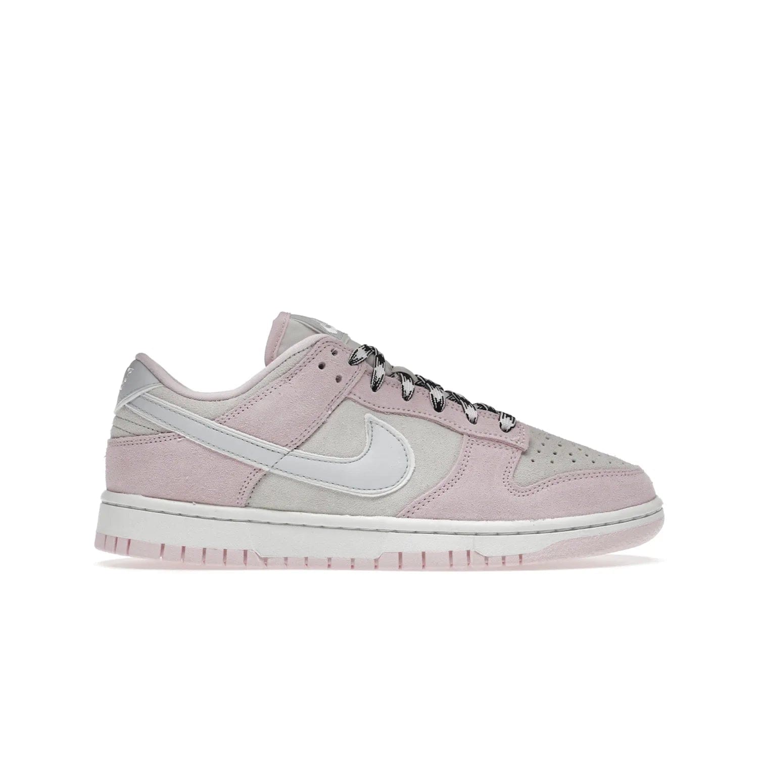Nike Dunk Low LX Pink Foam (Women's) - Image 1 - Only at www.BallersClubKickz.com - Feminine & fashionable Nike Dunk Low LX Pink Foam W sneaker. Featuring leather and synthetic materials and durable rubber sole. Lace-up design ensures a snug fit. Released Dec. 10th 2022, $120. Stylish and comfortable.