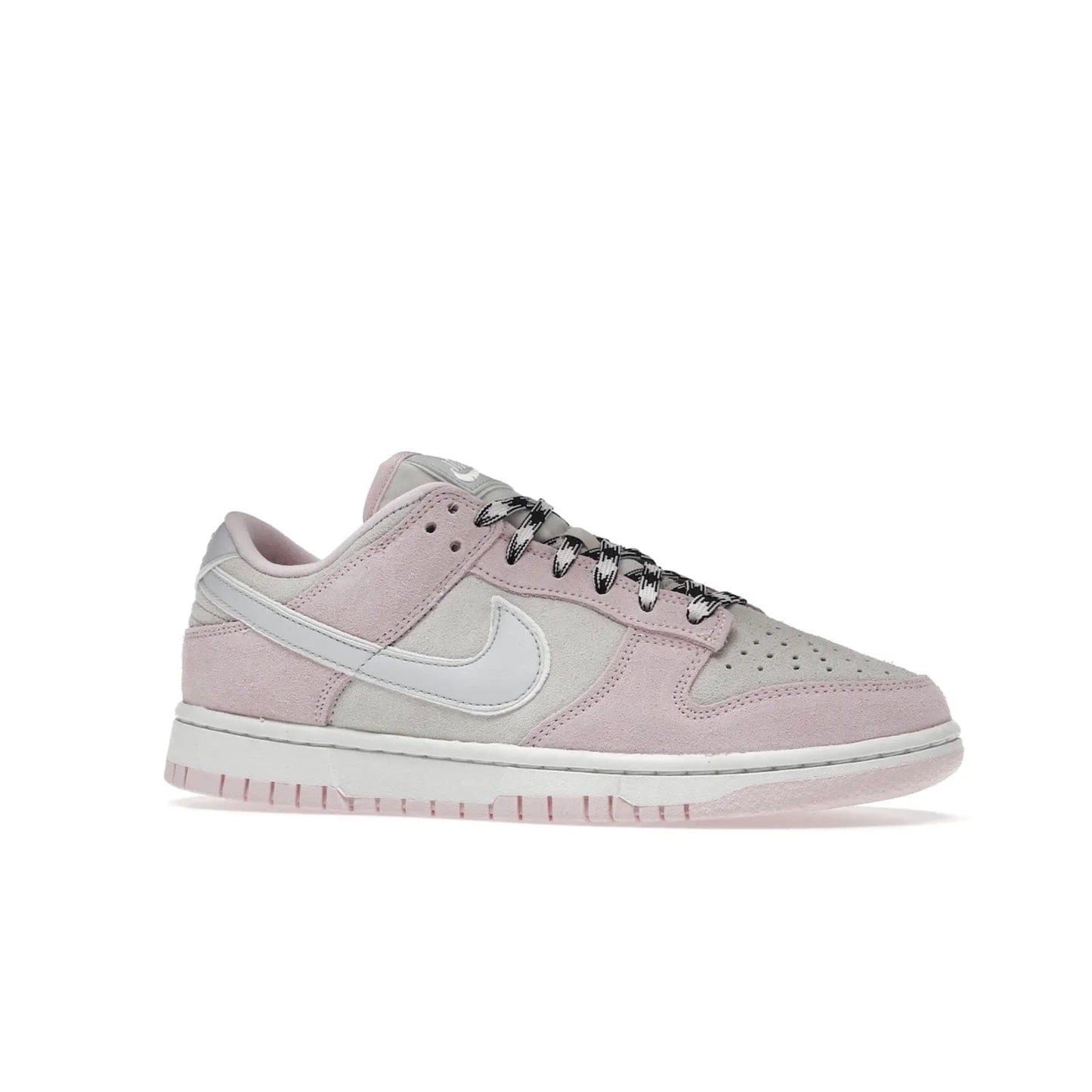 Nike Dunk Low LX Pink Foam (Women's) - Image 3 - Only at www.BallersClubKickz.com - Feminine & fashionable Nike Dunk Low LX Pink Foam W sneaker. Featuring leather and synthetic materials and durable rubber sole. Lace-up design ensures a snug fit. Released Dec. 10th 2022, $120. Stylish and comfortable.