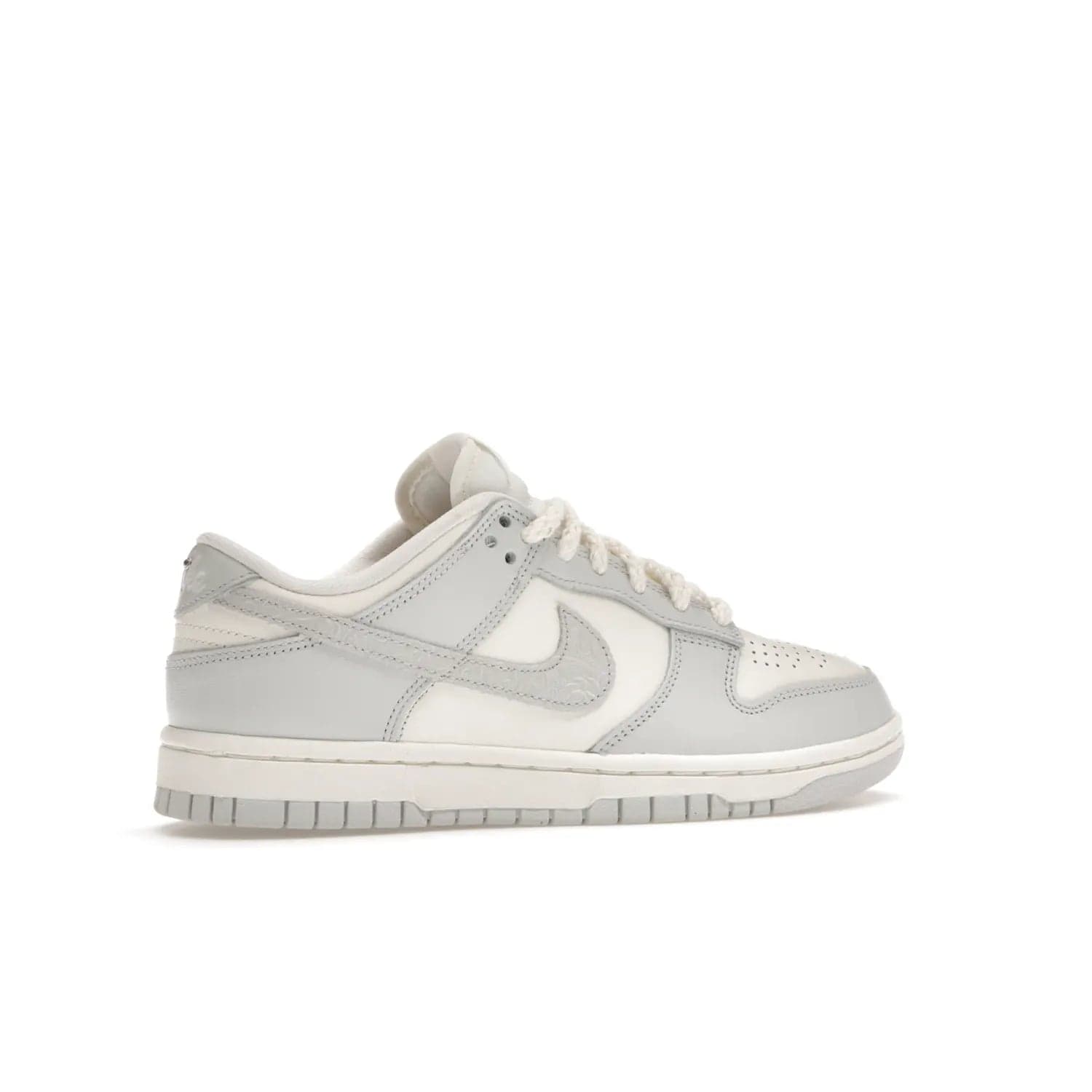 Nike Dunk Low Needlework Sail Aura (Women's) - Image 35 - Only at www.BallersClubKickz.com - Discover the Nike Dunk Low Needlework Sail Aura for Women. Boasting a beautiful Sail and Neutral Grey upper, this stylish sneaker offers durable materials with ultra-soft cushioning for all-day comfort. Get your pair today!