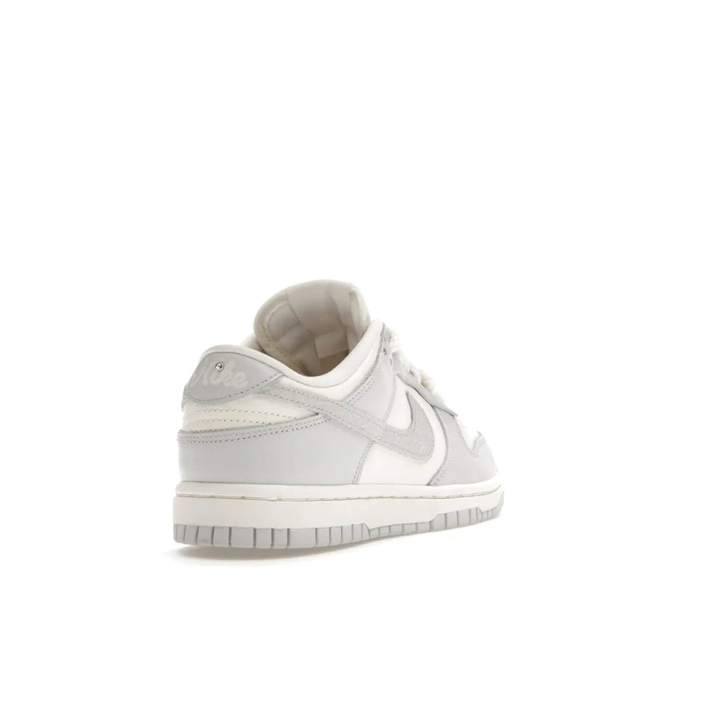 Nike Dunk Low Needlework Sail Aura (Women's) - Image 31 - Only at www.BallersClubKickz.com - Discover the Nike Dunk Low Needlework Sail Aura for Women. Boasting a beautiful Sail and Neutral Grey upper, this stylish sneaker offers durable materials with ultra-soft cushioning for all-day comfort. Get your pair today!
