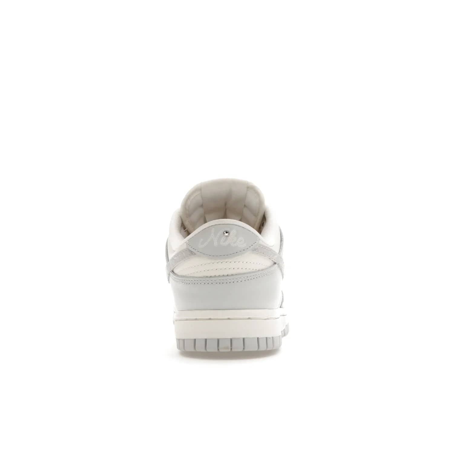 Nike Dunk Low Needlework Sail Aura (Women's) - Image 28 - Only at www.BallersClubKickz.com - Discover the Nike Dunk Low Needlework Sail Aura for Women. Boasting a beautiful Sail and Neutral Grey upper, this stylish sneaker offers durable materials with ultra-soft cushioning for all-day comfort. Get your pair today!