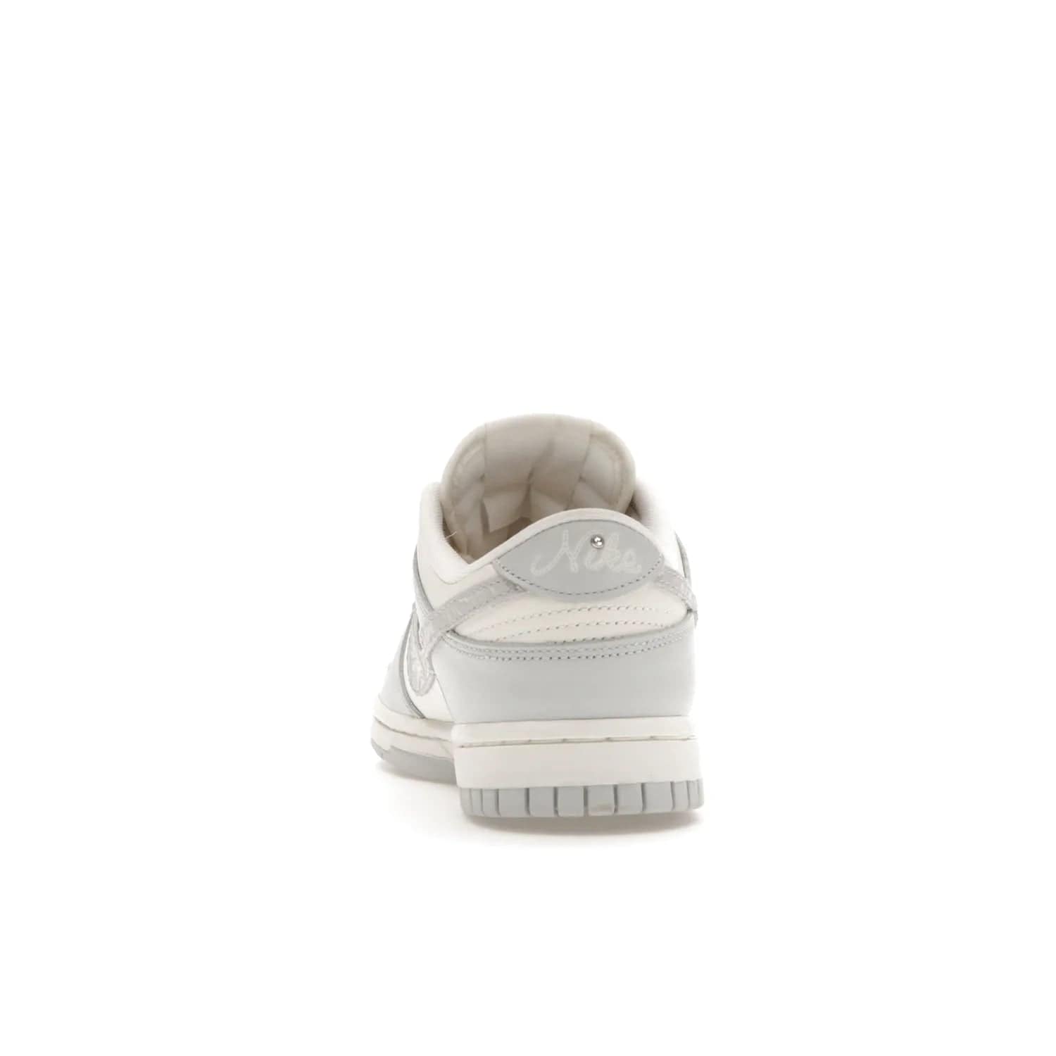 Nike Dunk Low Needlework Sail Aura (Women's) - Image 27 - Only at www.BallersClubKickz.com - Discover the Nike Dunk Low Needlework Sail Aura for Women. Boasting a beautiful Sail and Neutral Grey upper, this stylish sneaker offers durable materials with ultra-soft cushioning for all-day comfort. Get your pair today!