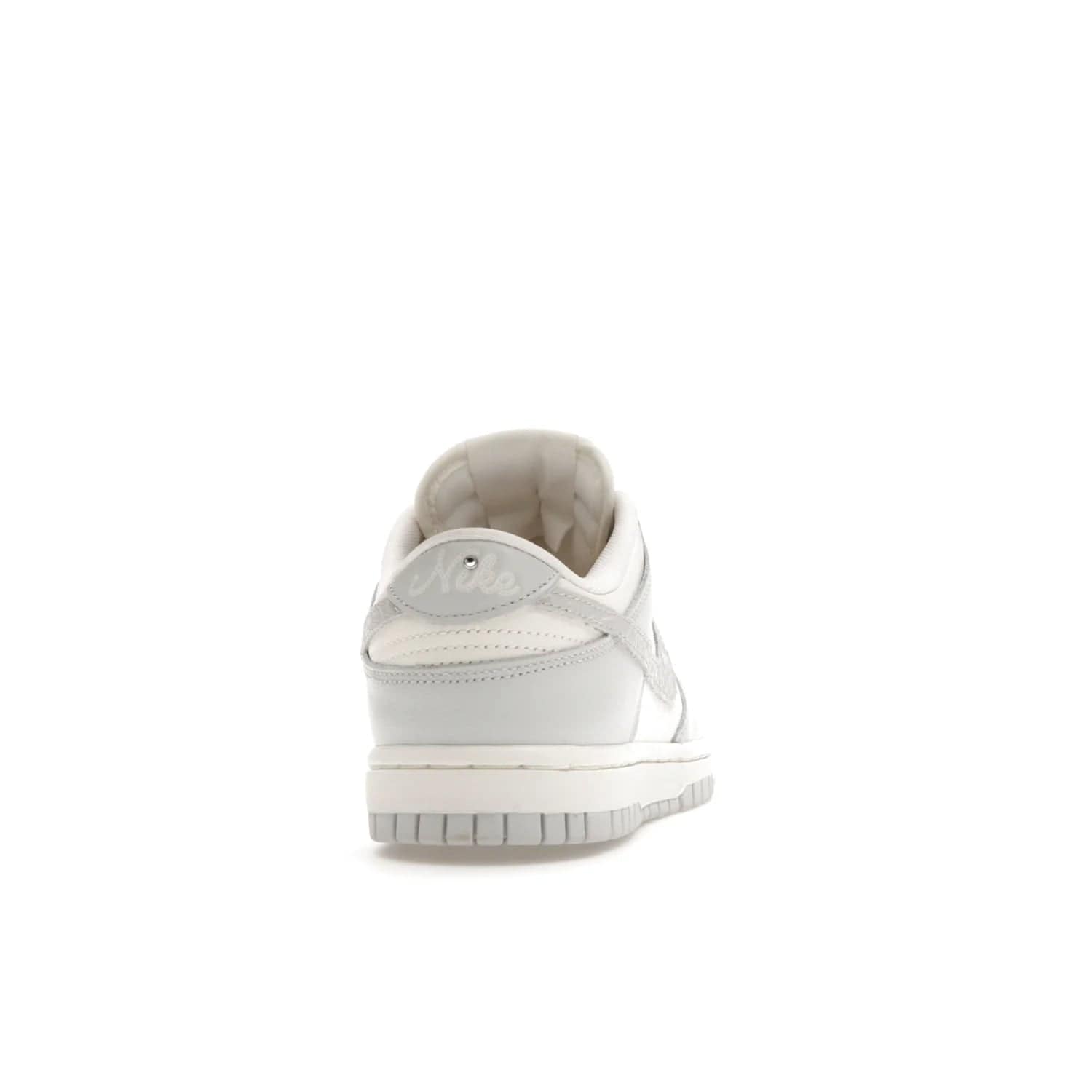 Nike Dunk Low Needlework Sail Aura (Women's) - Image 29 - Only at www.BallersClubKickz.com - Discover the Nike Dunk Low Needlework Sail Aura for Women. Boasting a beautiful Sail and Neutral Grey upper, this stylish sneaker offers durable materials with ultra-soft cushioning for all-day comfort. Get your pair today!