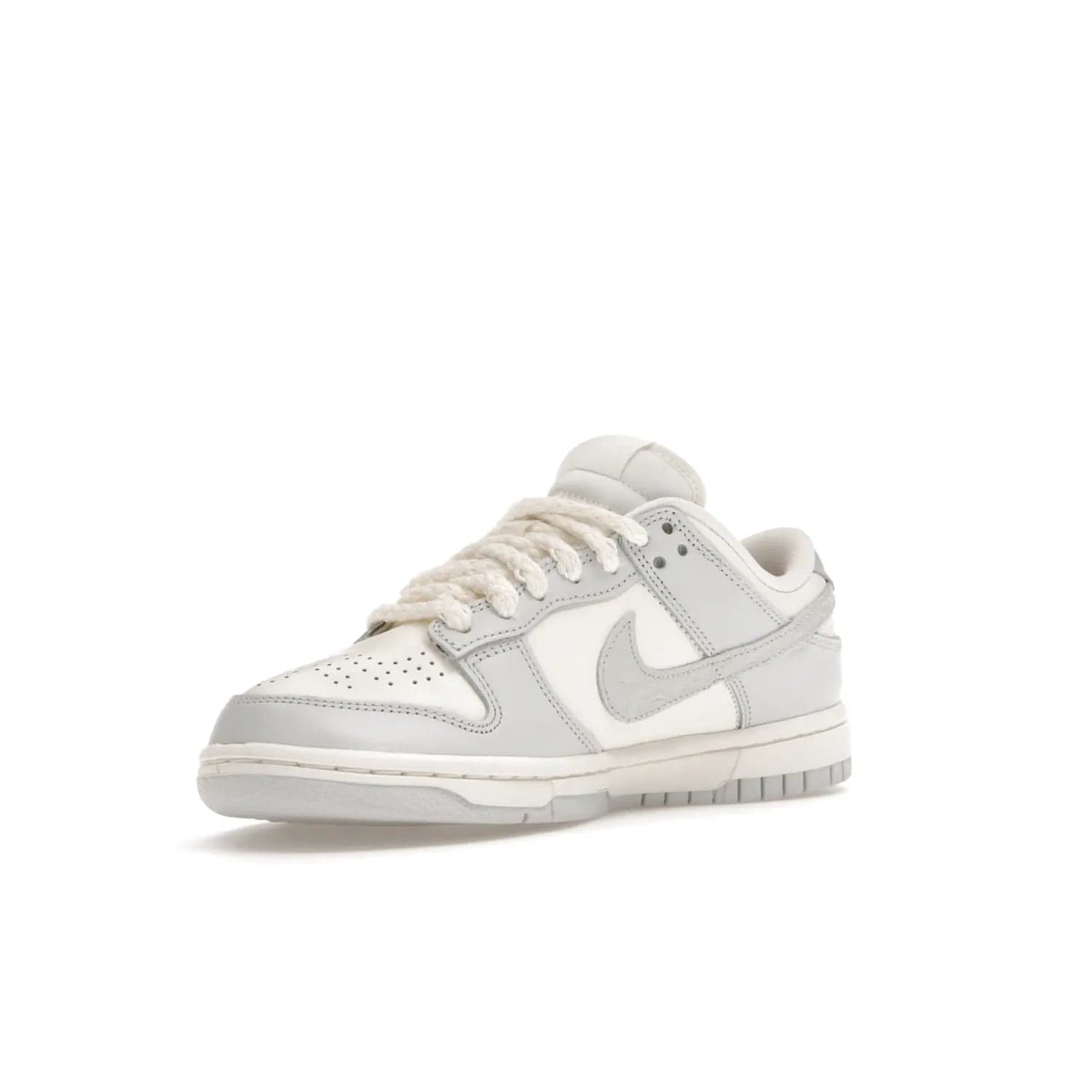 Nike Dunk Low Needlework Sail Aura (Women's) - Image 15 - Only at www.BallersClubKickz.com - Discover the Nike Dunk Low Needlework Sail Aura for Women. Boasting a beautiful Sail and Neutral Grey upper, this stylish sneaker offers durable materials with ultra-soft cushioning for all-day comfort. Get your pair today!
