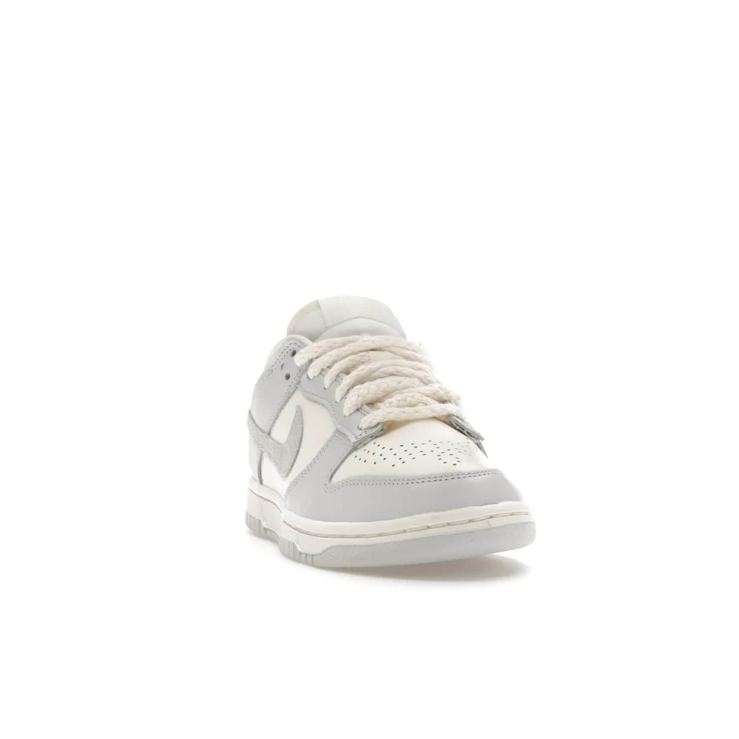 Nike Dunk Low Needlework Sail Aura (Women's) - Image 8 - Only at www.BallersClubKickz.com - Discover the Nike Dunk Low Needlework Sail Aura for Women. Boasting a beautiful Sail and Neutral Grey upper, this stylish sneaker offers durable materials with ultra-soft cushioning for all-day comfort. Get your pair today!