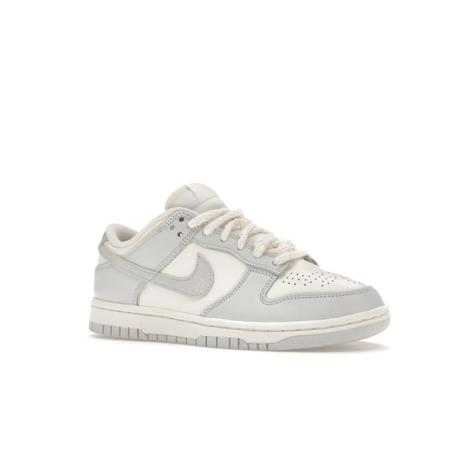 Nike Dunk Low Needlework Sail Aura (Women's) - Image 4 - Only at www.BallersClubKickz.com - Discover the Nike Dunk Low Needlework Sail Aura for Women. Boasting a beautiful Sail and Neutral Grey upper, this stylish sneaker offers durable materials with ultra-soft cushioning for all-day comfort. Get your pair today!