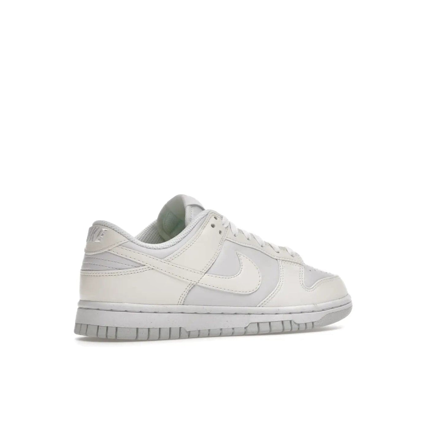 Nike Dunk Low Next Nature Sail (Women's) - Image 34 - Only at www.BallersClubKickz.com - The Nike Dunk Low Next Nature Sail delivers iconic style with sustainable innovation. This two-tone black and white Flyleather upper, constructed with 50% recycled materials, offers a stylish yet eco-friendly look. Available November 2021 for $100.