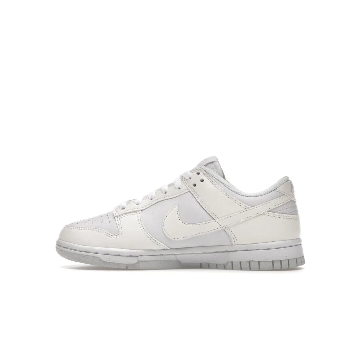 Nike Dunk Low Next Nature Sail (Women's) - Image 20 - Only at www.BallersClubKickz.com - The Nike Dunk Low Next Nature Sail delivers iconic style with sustainable innovation. This two-tone black and white Flyleather upper, constructed with 50% recycled materials, offers a stylish yet eco-friendly look. Available November 2021 for $100.