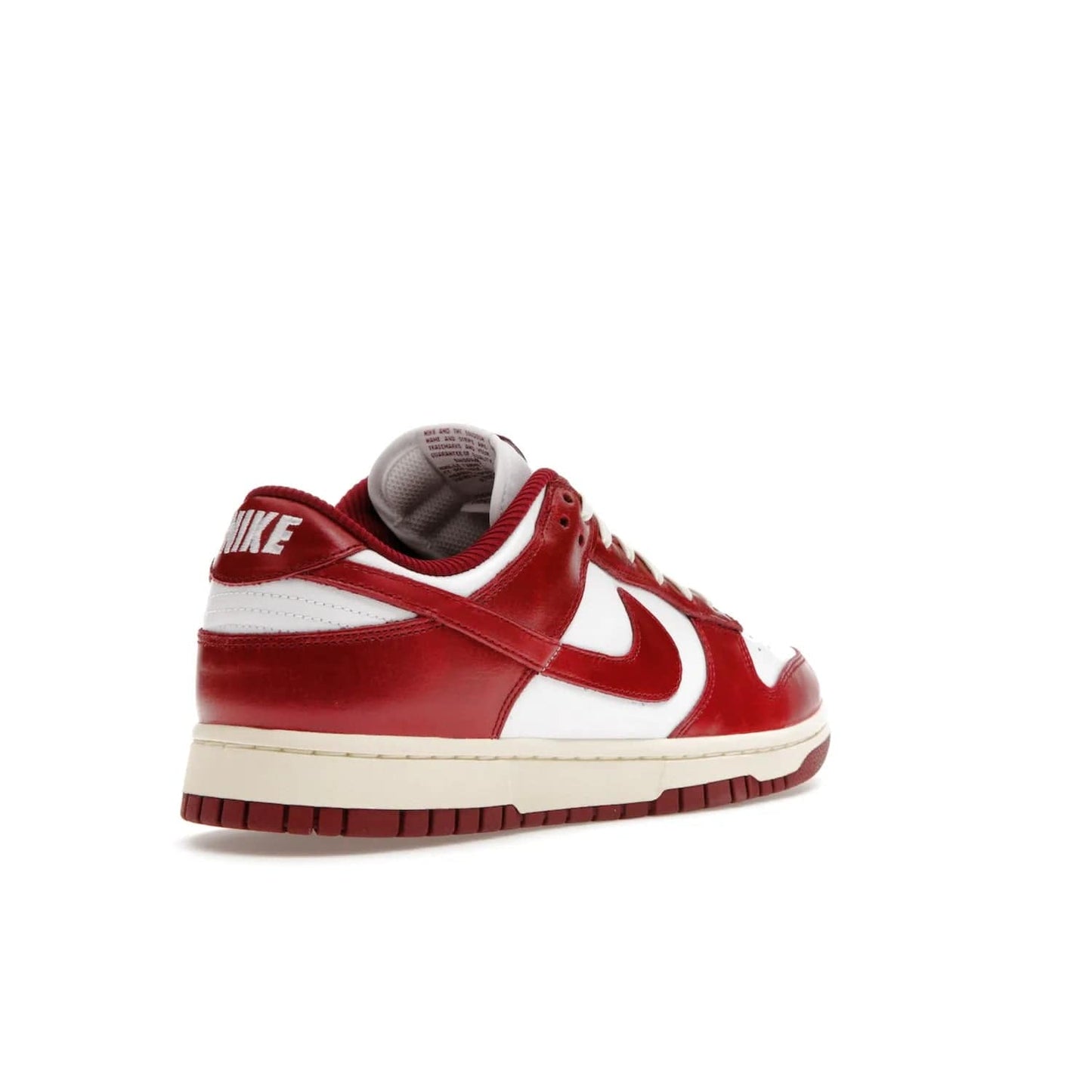 Nike Dunk Low PRM Vintage Team Red (Women's) - Image 32 - Only at www.BallersClubKickz.com - Shop the stylish Nike Dunk Low PRM Vintage Team Red. Signature Red and White leather with Coconut Milk midsoles for an aged finish. 21 April 2023 release.