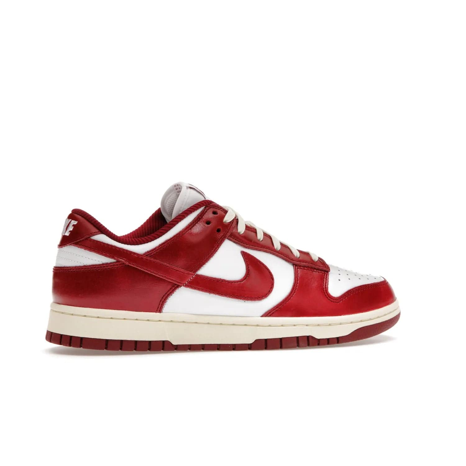 Nike Dunk Low PRM Vintage Team Red (Women's) - Image 35 - Only at www.BallersClubKickz.com - Shop the stylish Nike Dunk Low PRM Vintage Team Red. Signature Red and White leather with Coconut Milk midsoles for an aged finish. 21 April 2023 release.