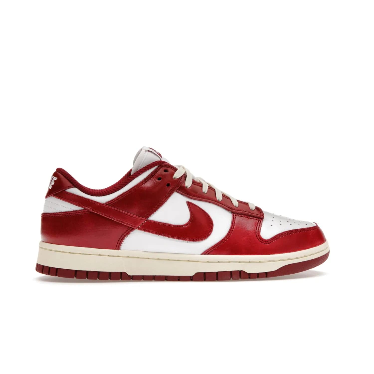 Nike Dunk Low PRM Vintage Team Red (Women's) - Image 36 - Only at www.BallersClubKickz.com - Shop the stylish Nike Dunk Low PRM Vintage Team Red. Signature Red and White leather with Coconut Milk midsoles for an aged finish. 21 April 2023 release.