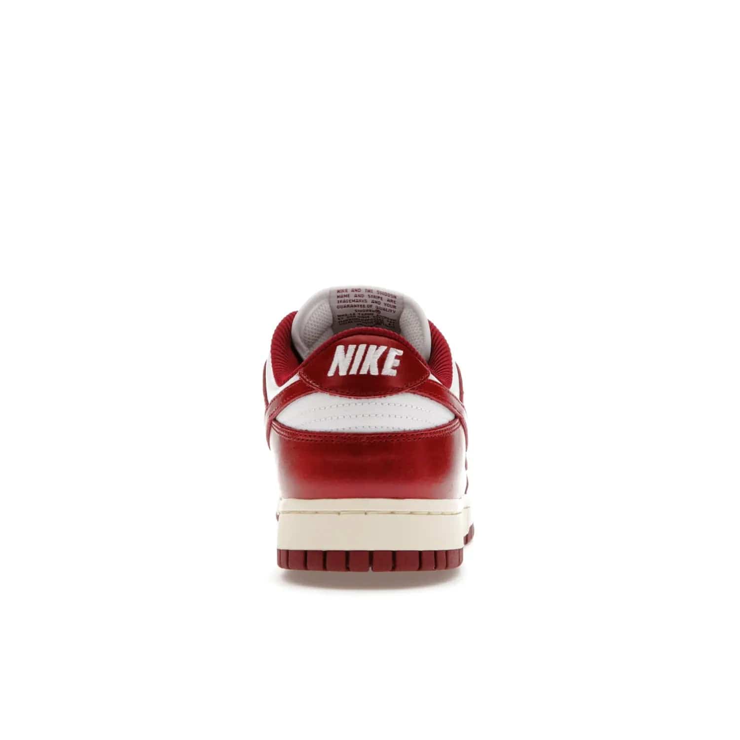 Nike Dunk Low PRM Vintage Team Red (Women's) - Image 28 - Only at www.BallersClubKickz.com - Shop the stylish Nike Dunk Low PRM Vintage Team Red. Signature Red and White leather with Coconut Milk midsoles for an aged finish. 21 April 2023 release.