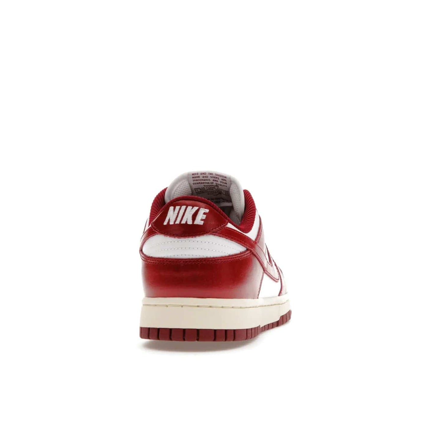 Nike Dunk Low PRM Vintage Team Red (Women's) - Image 29 - Only at www.BallersClubKickz.com - Shop the stylish Nike Dunk Low PRM Vintage Team Red. Signature Red and White leather with Coconut Milk midsoles for an aged finish. 21 April 2023 release.