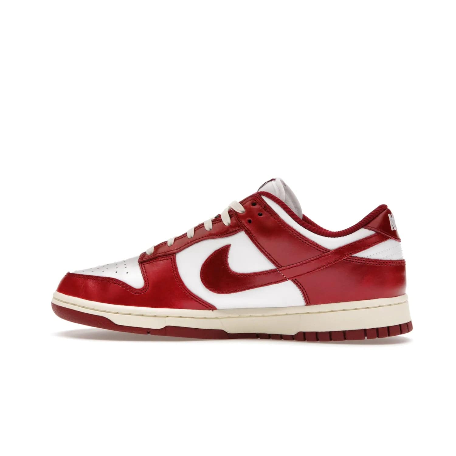Nike Dunk Low PRM Vintage Team Red (Women's) - Image 20 - Only at www.BallersClubKickz.com - Shop the stylish Nike Dunk Low PRM Vintage Team Red. Signature Red and White leather with Coconut Milk midsoles for an aged finish. 21 April 2023 release.