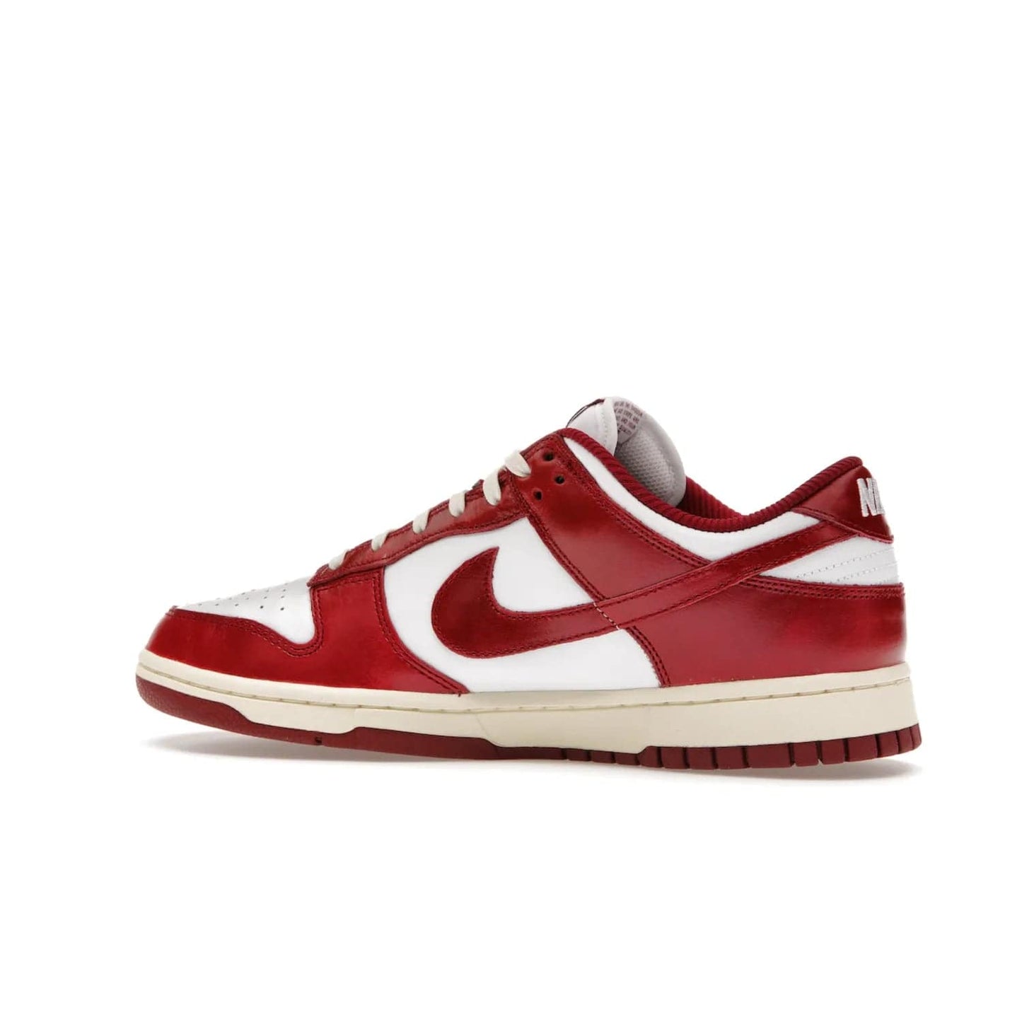 Nike Dunk Low PRM Vintage Team Red (Women's) - Image 21 - Only at www.BallersClubKickz.com - Shop the stylish Nike Dunk Low PRM Vintage Team Red. Signature Red and White leather with Coconut Milk midsoles for an aged finish. 21 April 2023 release.