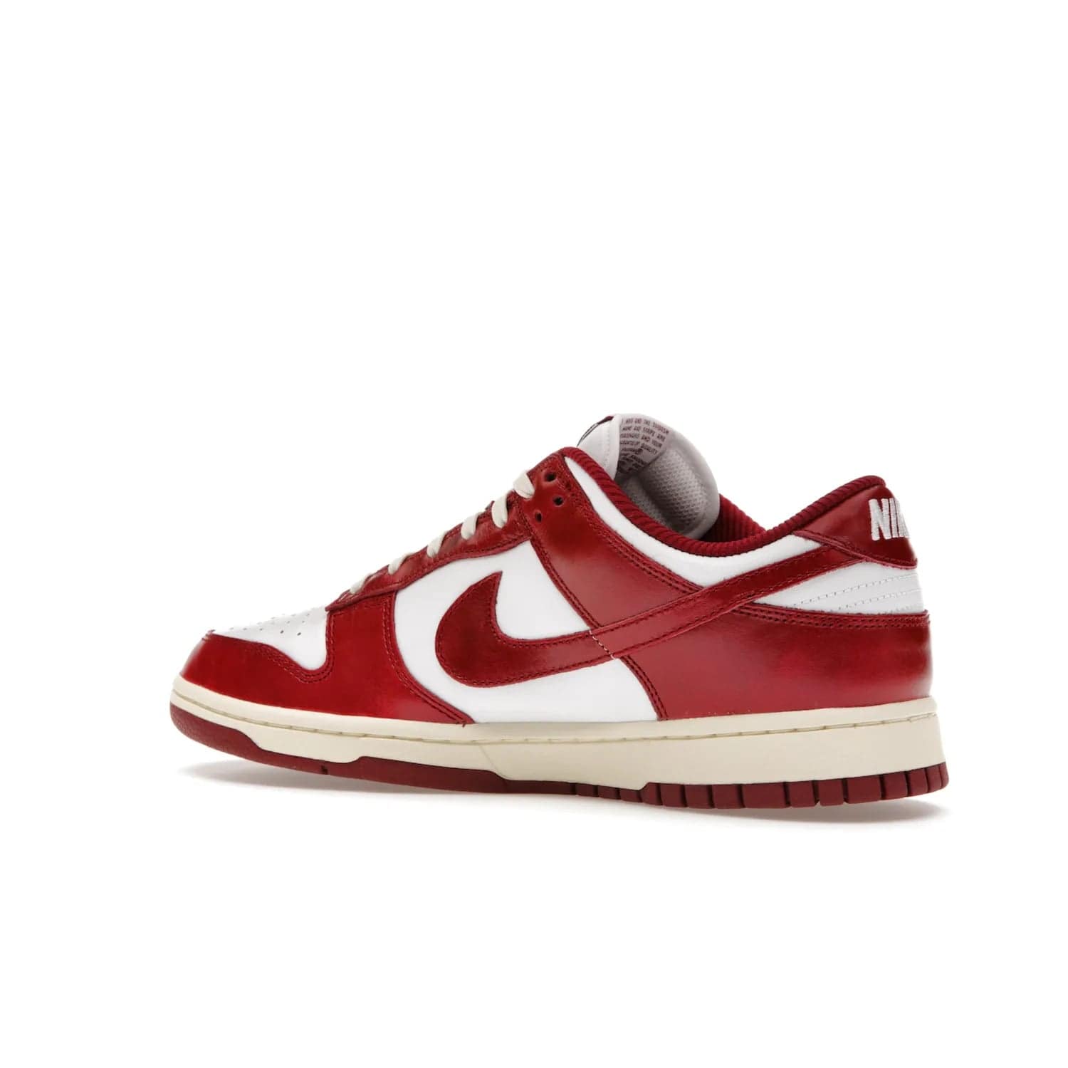 Nike Dunk Low PRM Vintage Team Red (Women's) - Image 22 - Only at www.BallersClubKickz.com - Shop the stylish Nike Dunk Low PRM Vintage Team Red. Signature Red and White leather with Coconut Milk midsoles for an aged finish. 21 April 2023 release.