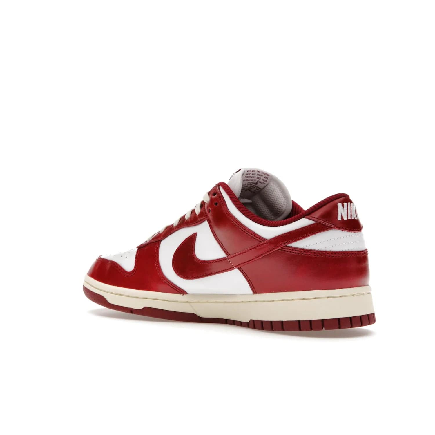 Nike Dunk Low PRM Vintage Team Red (Women's) - Image 23 - Only at www.BallersClubKickz.com - Shop the stylish Nike Dunk Low PRM Vintage Team Red. Signature Red and White leather with Coconut Milk midsoles for an aged finish. 21 April 2023 release.