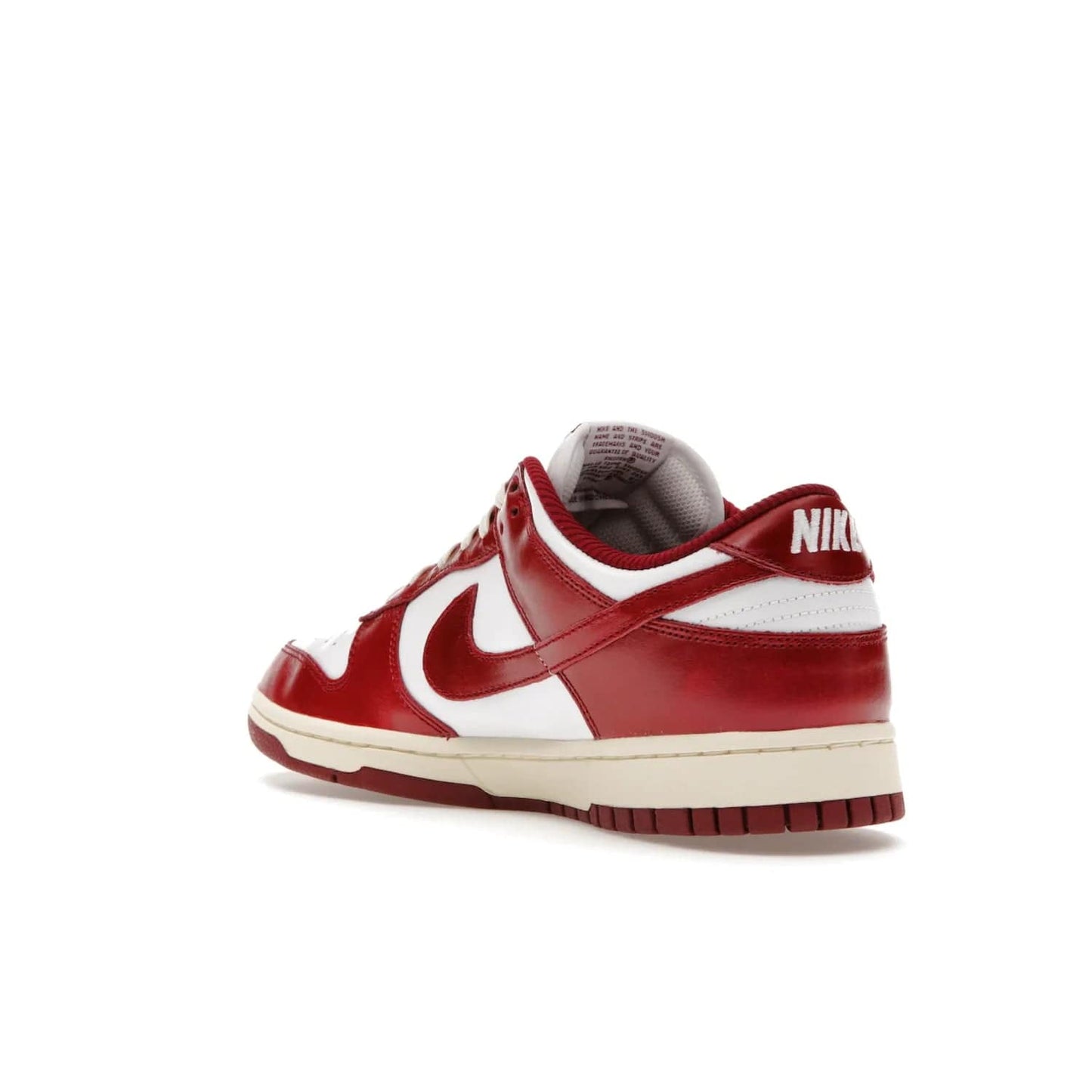 Nike Dunk Low PRM Vintage Team Red (Women's) - Image 24 - Only at www.BallersClubKickz.com - Shop the stylish Nike Dunk Low PRM Vintage Team Red. Signature Red and White leather with Coconut Milk midsoles for an aged finish. 21 April 2023 release.