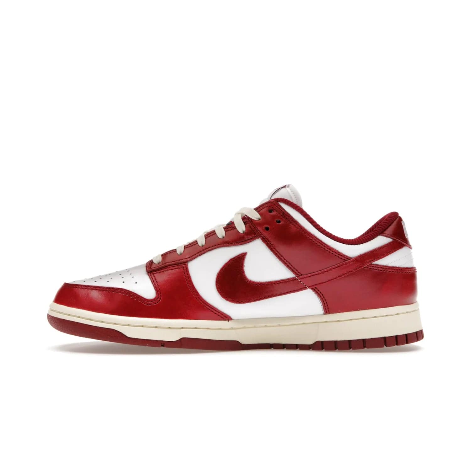 Nike Dunk Low PRM Vintage Team Red (Women's) - Image 19 - Only at www.BallersClubKickz.com - Shop the stylish Nike Dunk Low PRM Vintage Team Red. Signature Red and White leather with Coconut Milk midsoles for an aged finish. 21 April 2023 release.
