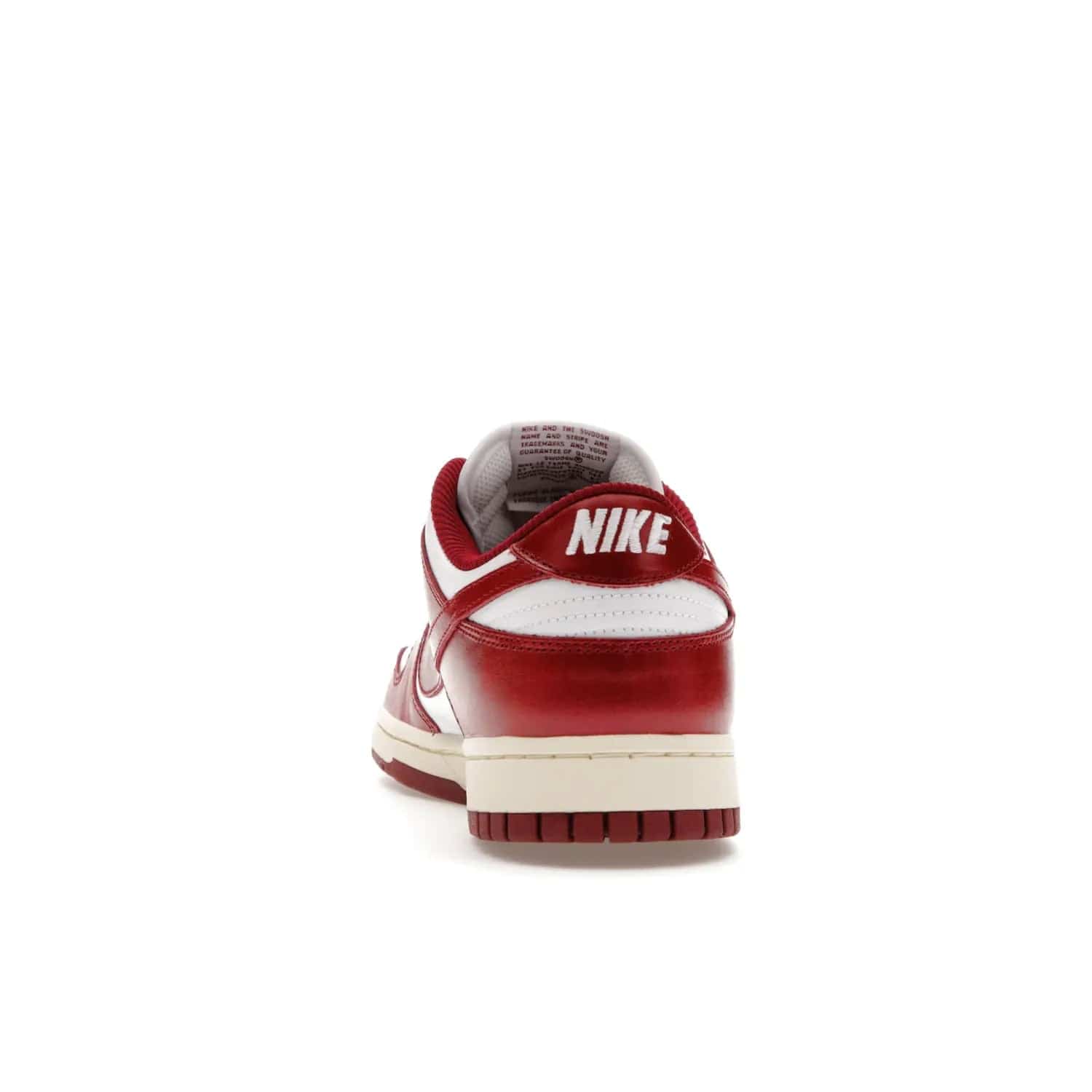 Nike Dunk Low PRM Vintage Team Red (Women's) - Image 27 - Only at www.BallersClubKickz.com - Shop the stylish Nike Dunk Low PRM Vintage Team Red. Signature Red and White leather with Coconut Milk midsoles for an aged finish. 21 April 2023 release.