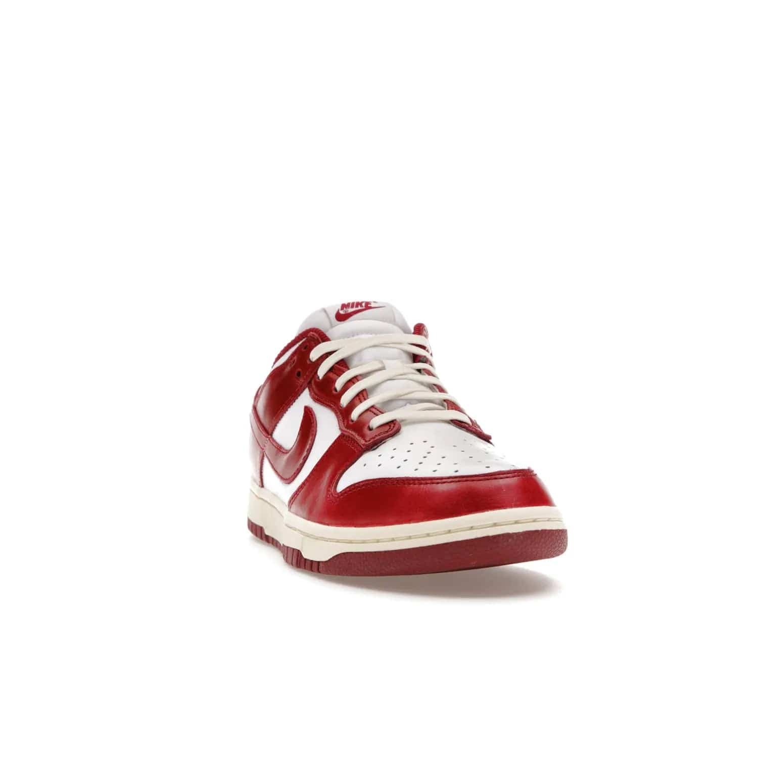 Nike Dunk Low PRM Vintage Team Red (Women's) - Image 8 - Only at www.BallersClubKickz.com - Shop the stylish Nike Dunk Low PRM Vintage Team Red. Signature Red and White leather with Coconut Milk midsoles for an aged finish. 21 April 2023 release.