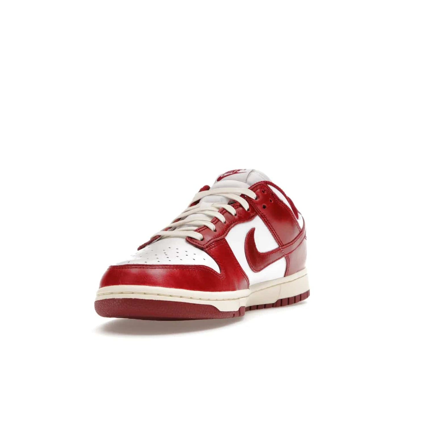 Nike Dunk Low PRM Vintage Team Red (Women's) - Image 13 - Only at www.BallersClubKickz.com - Shop the stylish Nike Dunk Low PRM Vintage Team Red. Signature Red and White leather with Coconut Milk midsoles for an aged finish. 21 April 2023 release.
