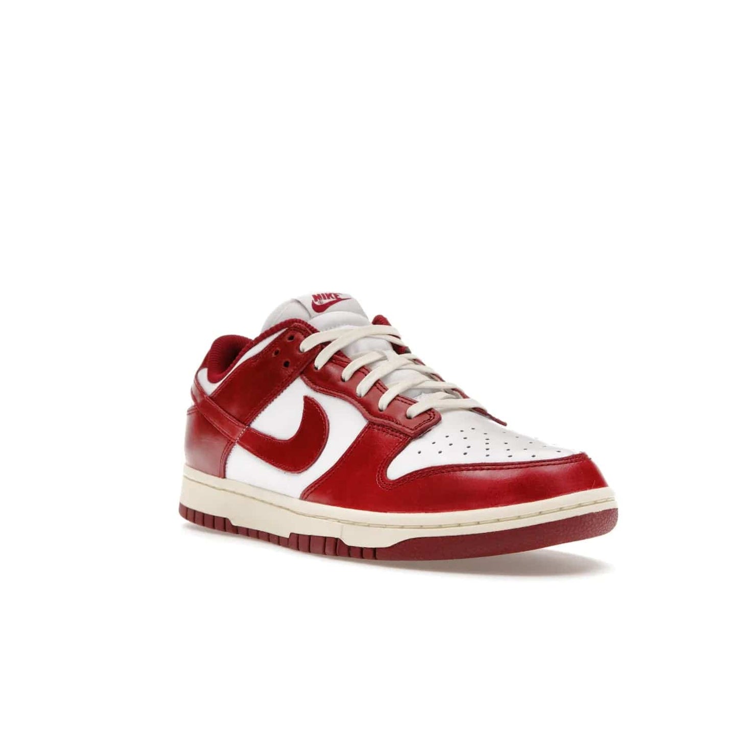 Nike Dunk Low PRM Vintage Team Red (Women's) - Image 6 - Only at www.BallersClubKickz.com - Shop the stylish Nike Dunk Low PRM Vintage Team Red. Signature Red and White leather with Coconut Milk midsoles for an aged finish. 21 April 2023 release.