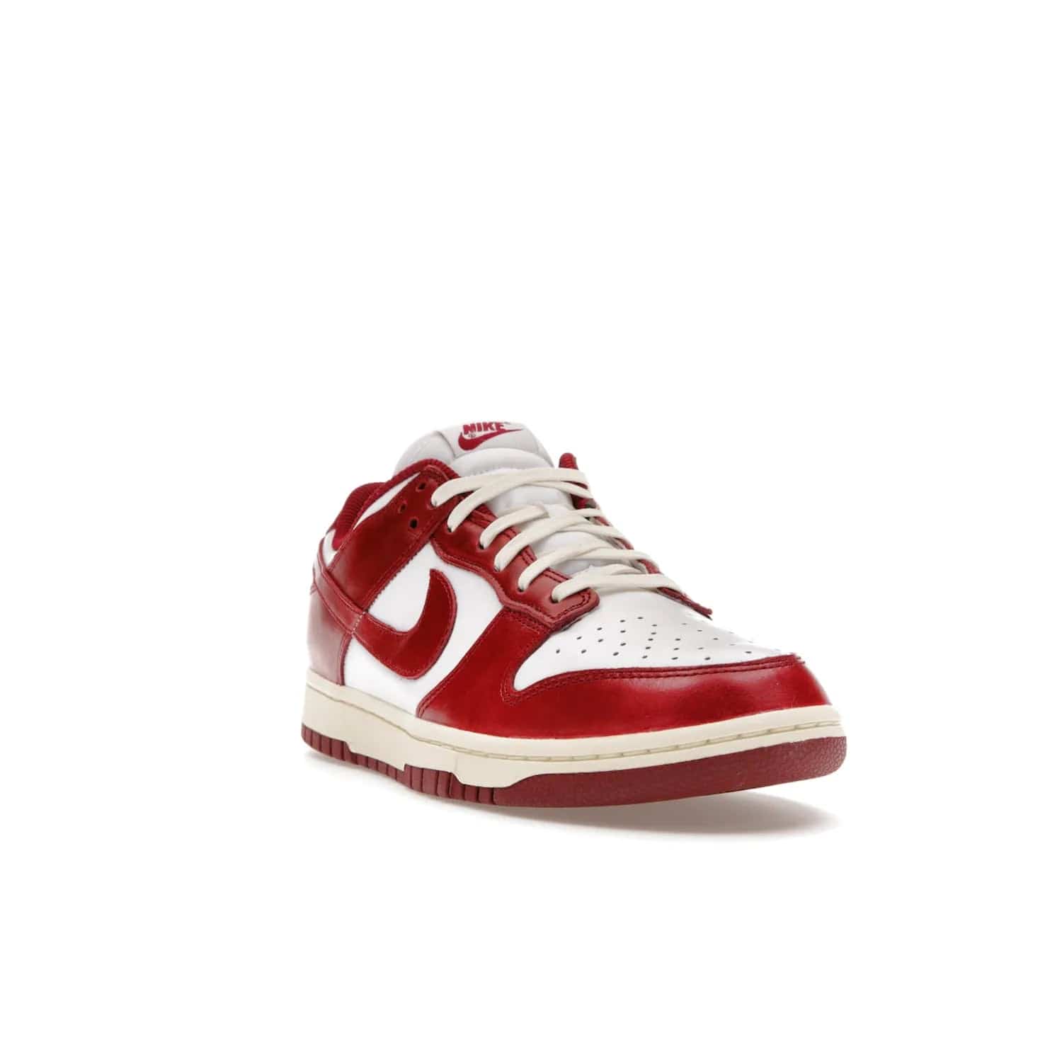 Nike Dunk Low PRM Vintage Team Red (Women's) - Image 7 - Only at www.BallersClubKickz.com - Shop the stylish Nike Dunk Low PRM Vintage Team Red. Signature Red and White leather with Coconut Milk midsoles for an aged finish. 21 April 2023 release.