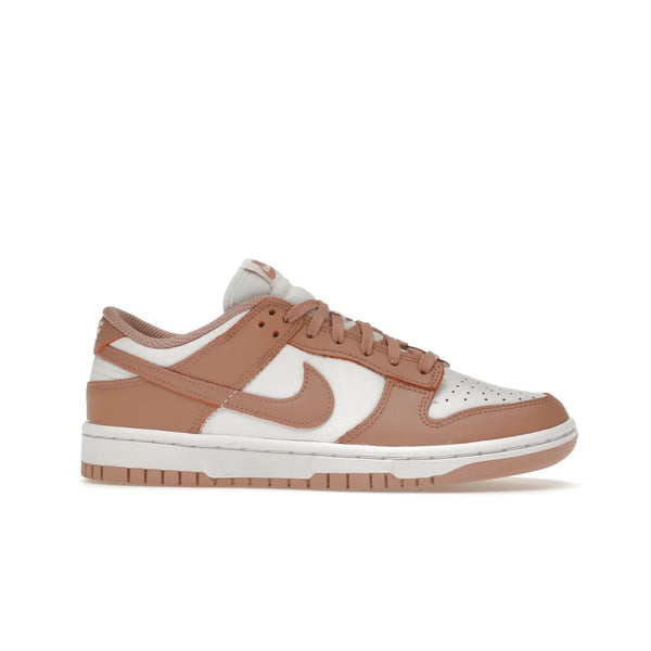 Nike Dunk Low Rose Whisper (Women's) - Image 2 - Only at www.BallersClubKickz.com - The Nike Dunk Low Rose Whisper is the perfect summer shoe with classic two-tone look and vintage-inspired design. Features white and Rose Whisper leather upper, woven tongue labels and EVA foam sole for plush cushioning. Available June 2022 at $100.