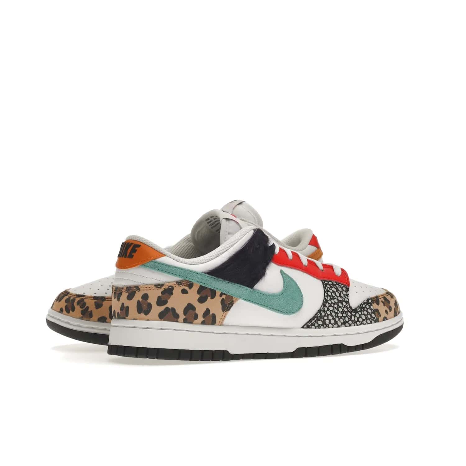 Nike Dunk Low Safari Mix (Women's) - Image 34 - Only at www.BallersClubKickz.com - Express your unique style with the Women’s Nike Dunk Low Safari Mix. Featuring a vibrant mix of white leather, leopard Durabuck, faux-horsehair, suede, and more, this stylish sneaker will turn heads. Shop now for a bold look at an affordable $120 price tag. Available in May 2022.