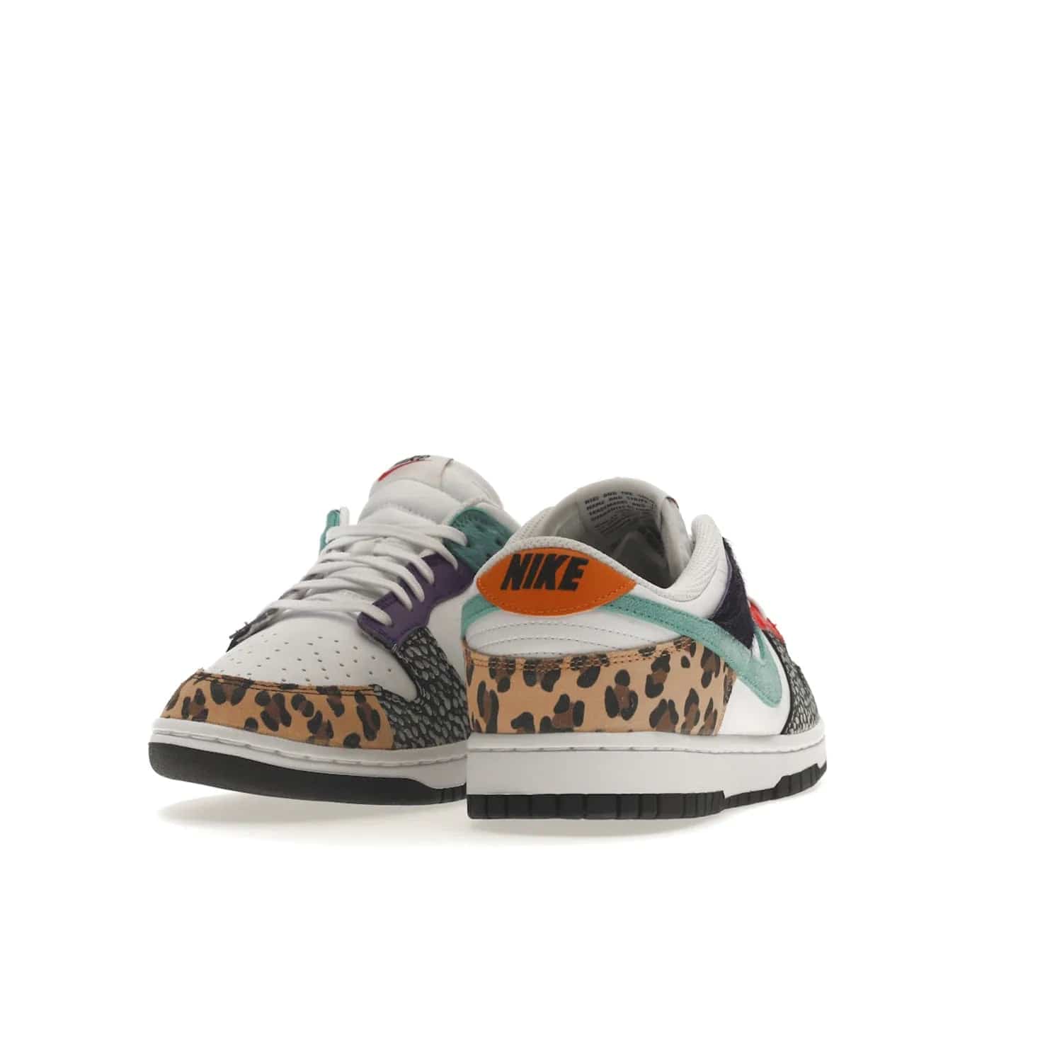 Nike Dunk Low Safari Mix (Women's) - Image 30 - Only at www.BallersClubKickz.com - Express your unique style with the Women’s Nike Dunk Low Safari Mix. Featuring a vibrant mix of white leather, leopard Durabuck, faux-horsehair, suede, and more, this stylish sneaker will turn heads. Shop now for a bold look at an affordable $120 price tag. Available in May 2022.