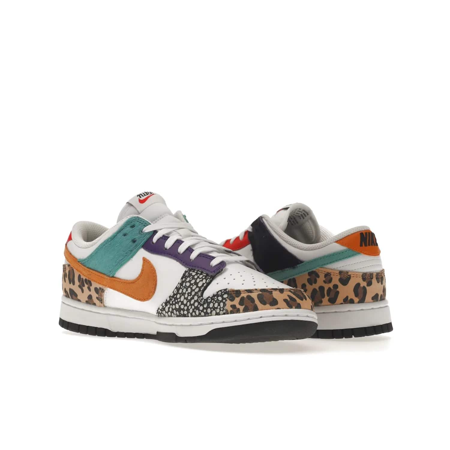Nike Dunk Low Safari Mix (Women's) - Image 23 - Only at www.BallersClubKickz.com - Express your unique style with the Women’s Nike Dunk Low Safari Mix. Featuring a vibrant mix of white leather, leopard Durabuck, faux-horsehair, suede, and more, this stylish sneaker will turn heads. Shop now for a bold look at an affordable $120 price tag. Available in May 2022.