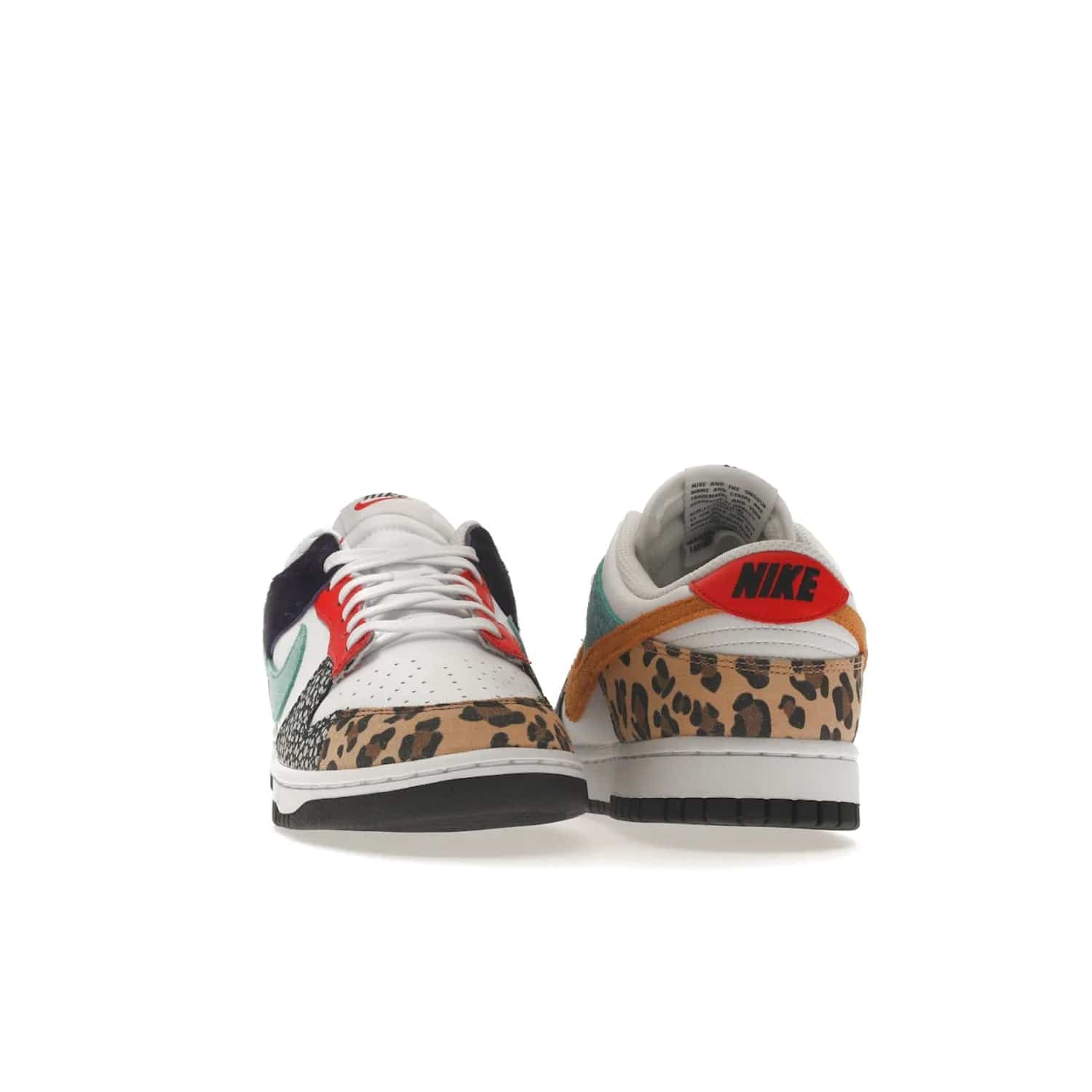 Nike Dunk Low Safari Mix (Women's) - Image 9 - Only at www.BallersClubKickz.com - Express your unique style with the Women’s Nike Dunk Low Safari Mix. Featuring a vibrant mix of white leather, leopard Durabuck, faux-horsehair, suede, and more, this stylish sneaker will turn heads. Shop now for a bold look at an affordable $120 price tag. Available in May 2022.