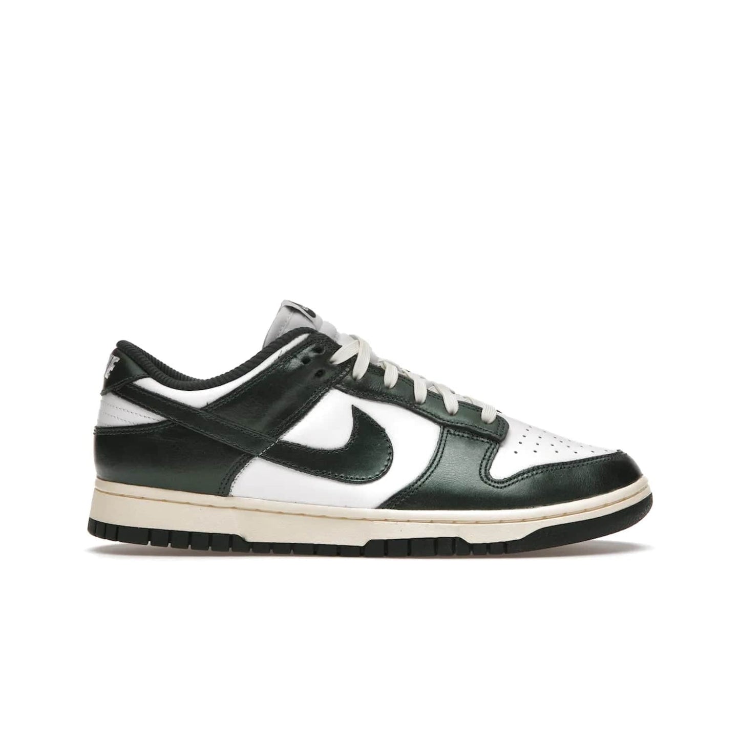 Nike Dunk Low Vintage Green (Women's) - Image 1 - Only at www.BallersClubKickz.com - Vintage-inspired Nike Dunk Low Retro Green (W) combines classic white and Pro Green leather upper with yellowing for a perfect retro look. Now available for 2021.